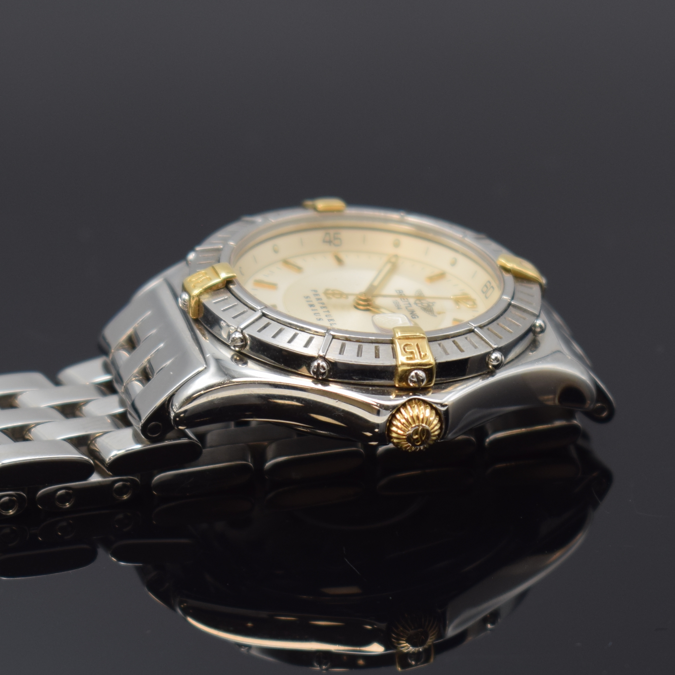 Detail c: BREITLING Damenarmbanduhr Serie Perpetual Sirius Referenz B62022, Schweiz um 1995, Edelstahl/Gold kombiniert inkl. Pilotband m. Faltschl., Boden ...