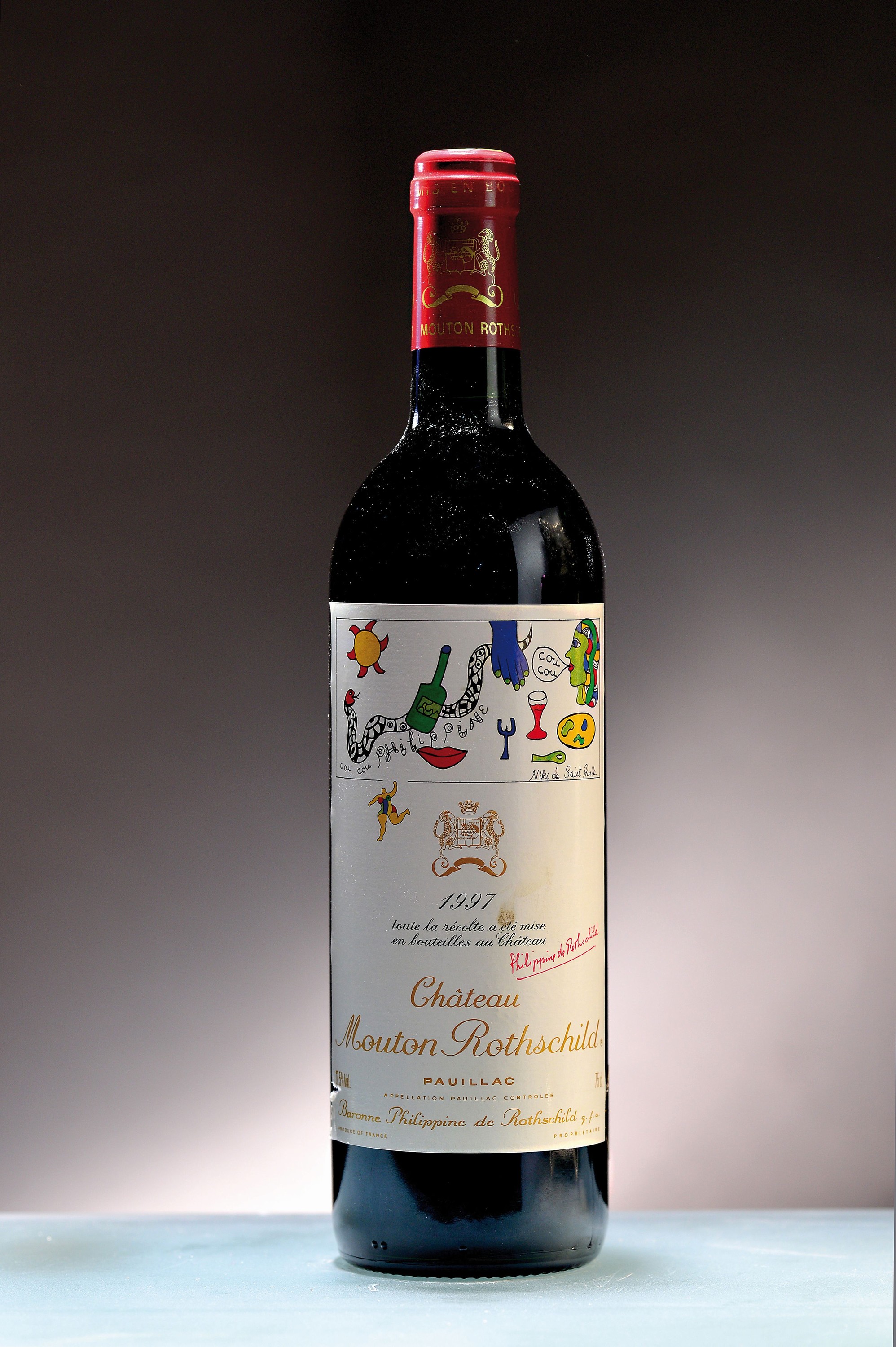 1 Flasche 1997 Chateau Mouton Rothschild, Pauillac, ca. 75cl, 12,5%Vol., Künstleretikettvon Nikki de Saint Phalle, high fill, Etikett min. ...