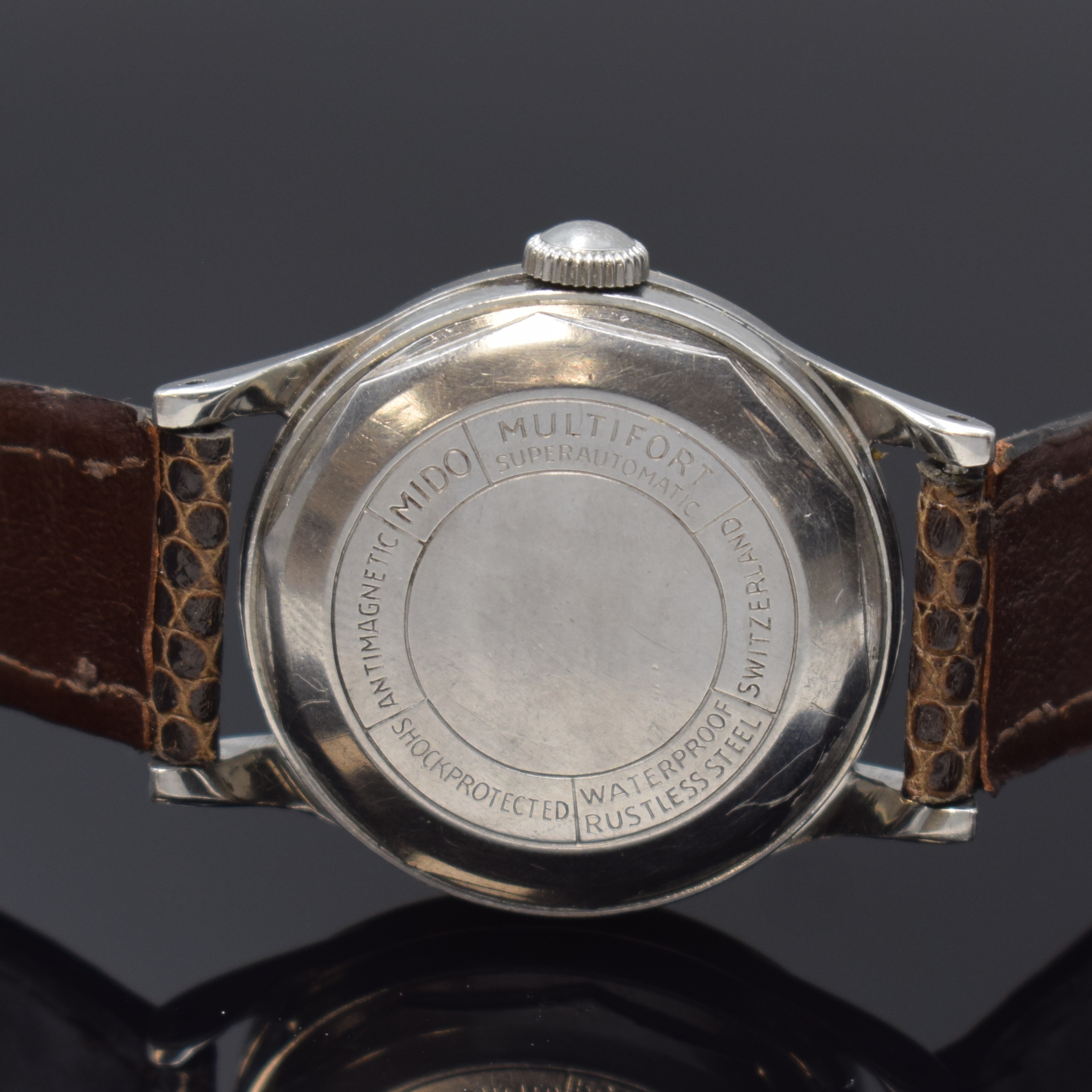 Detail c: MIDO Multifort Powerwind Herrenarmbanduhr, Schweiz um 1958, Edelstahlgeh., Boden verschr., Goldlünette aufgedr., schwarzes Zifferblatt altersbed. ...
