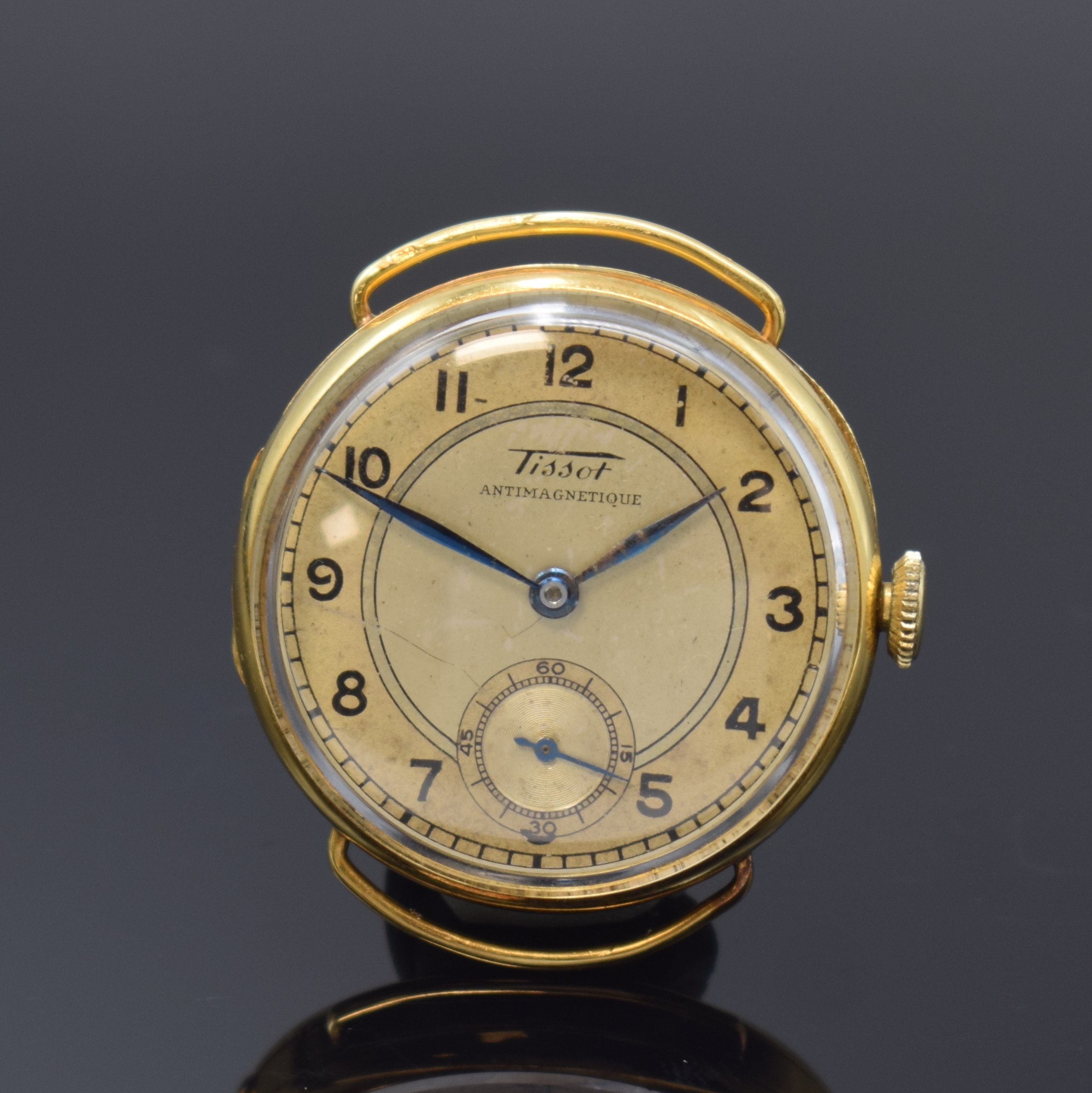 TISSOT Antimagnetique Herrenarmbanduhr in GG 750/000, Schweiz um 1938, Handaufzug, Scharnierboden, Glasrand aufgedr., feste Bandanst., silb. ...