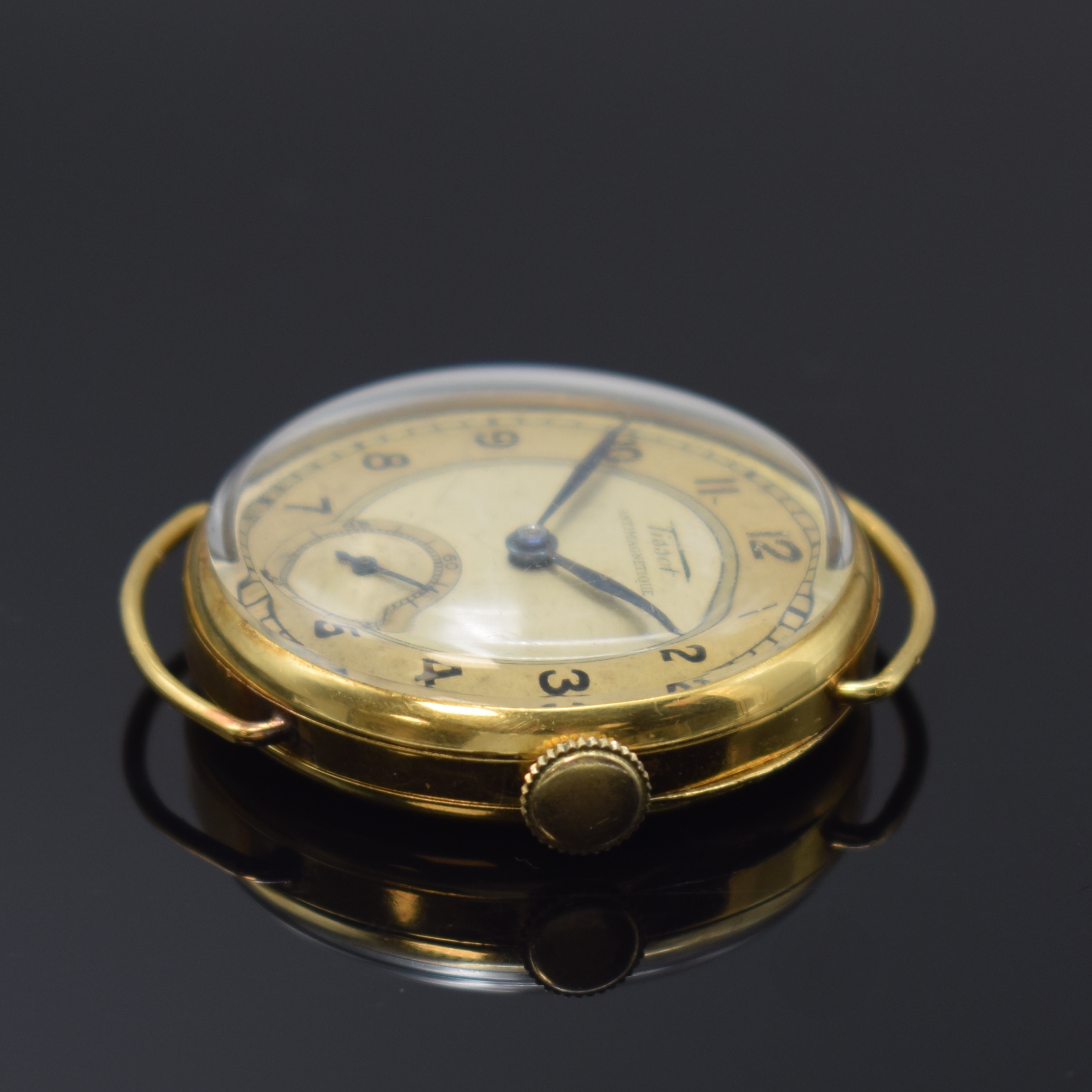 Detail a: TISSOT Antimagnetique Herrenarmbanduhr in GG 750/000, Schweiz um 1938, Handaufzug, Scharnierboden, Glasrand aufgedr., feste Bandanst., silb. ...