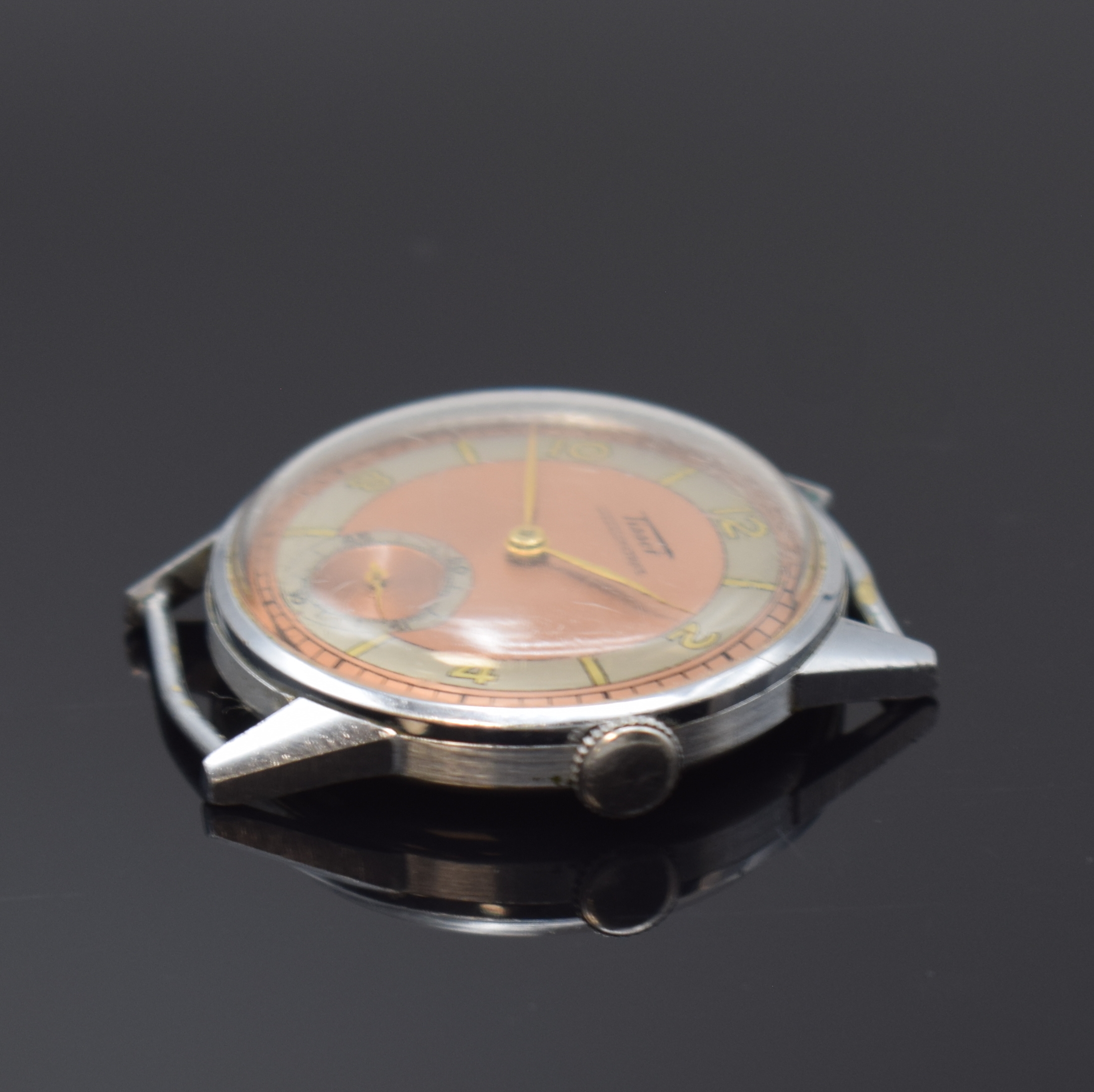 Detail a: TISSOT Antimagnetique Herrenarmbanduhr, Schweiz um 1942, Handaufzug, verchr. Geh., Edelstahlboden und Glasrand aufgedr., feste Bandanst., ...