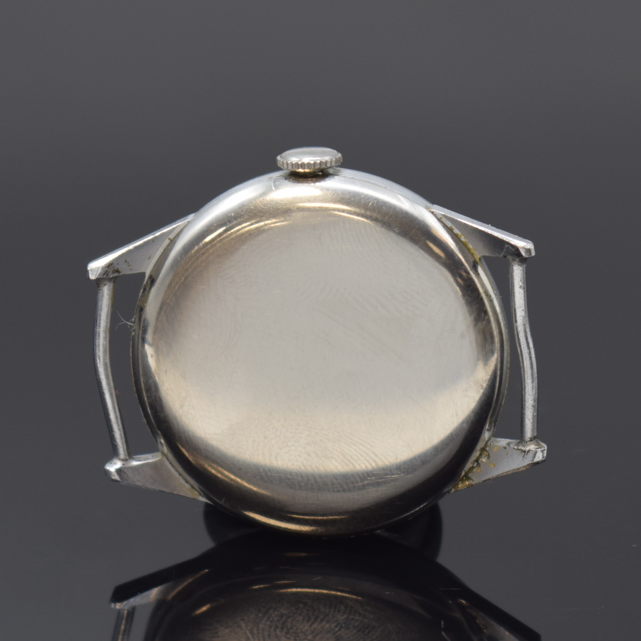 Detail b: TISSOT Antimagnetique Herrenarmbanduhr, Schweiz um 1942, Handaufzug, verchr. Geh., Edelstahlboden und Glasrand aufgedr., feste Bandanst., ...