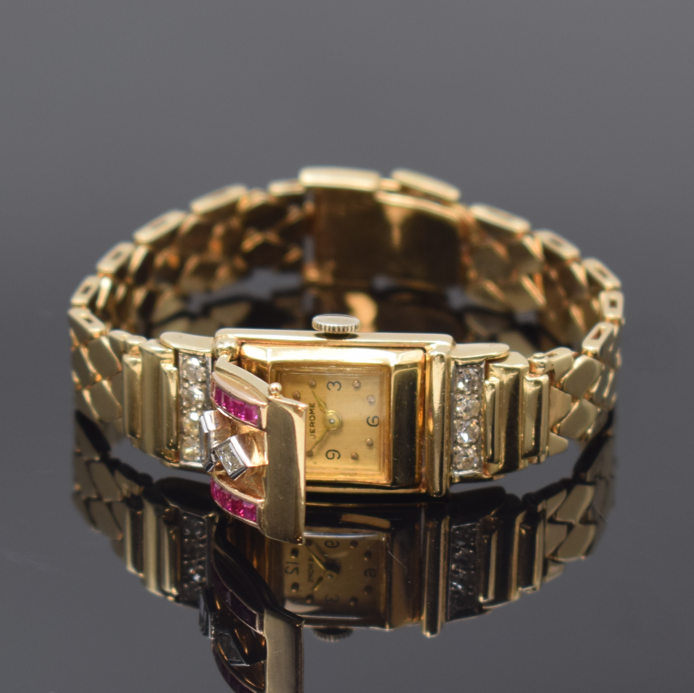 Ausgefallene Damenarmbanduhr in Rosegold 585/000 mit Diamanten und Rubinen, Handaufzug, Schweiz/USA um 1940, wohl Juweliersarbeit, Boden aufgedr., ...