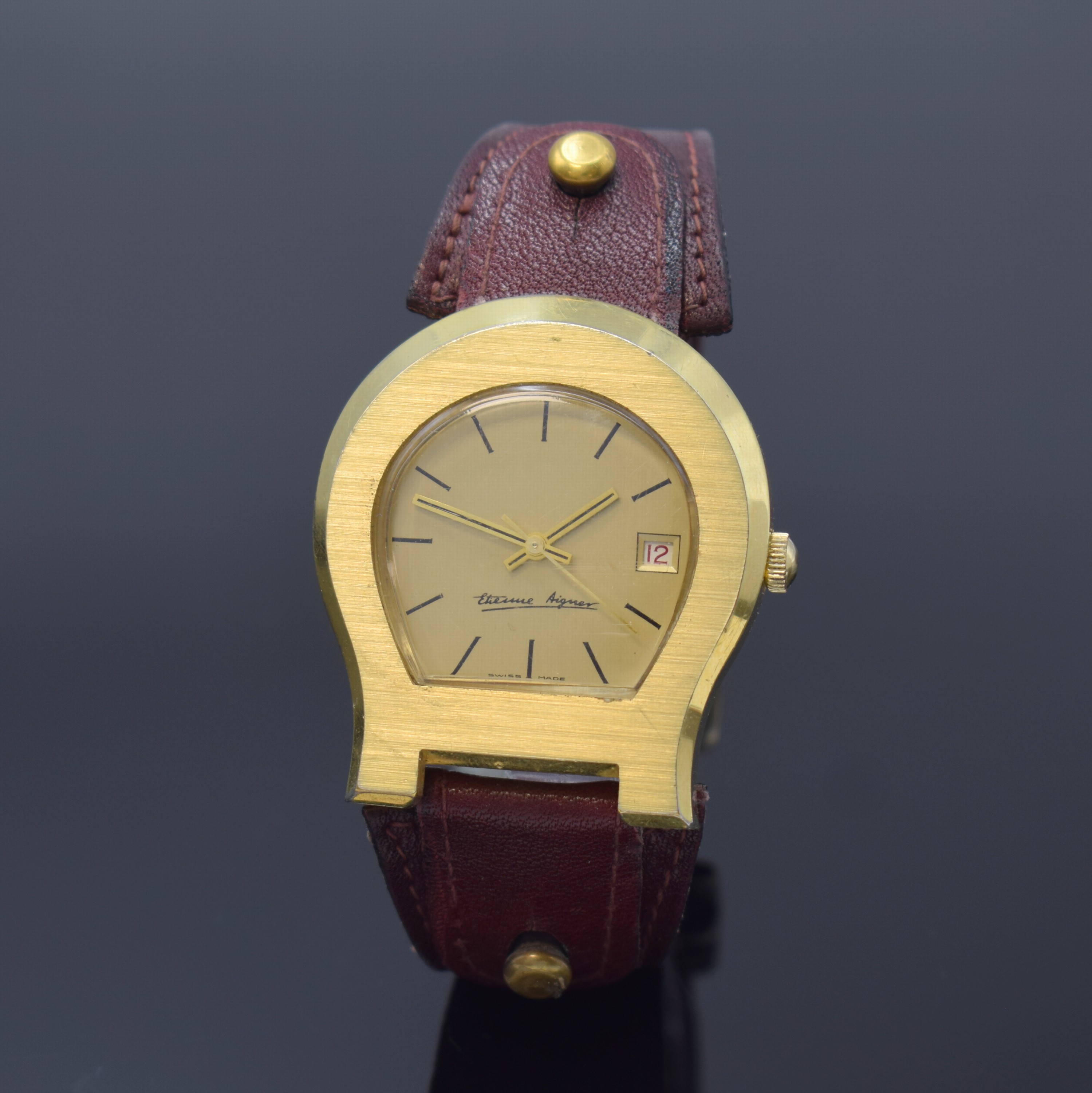 ETIENNE AIGNER Herrenarmbanduhr sogenanntes Hufeisen, Automatik, Schweiz um 1980, verg. Geh. inkl. Lederband m. orig. Dornschl., Edelstahlboden ...