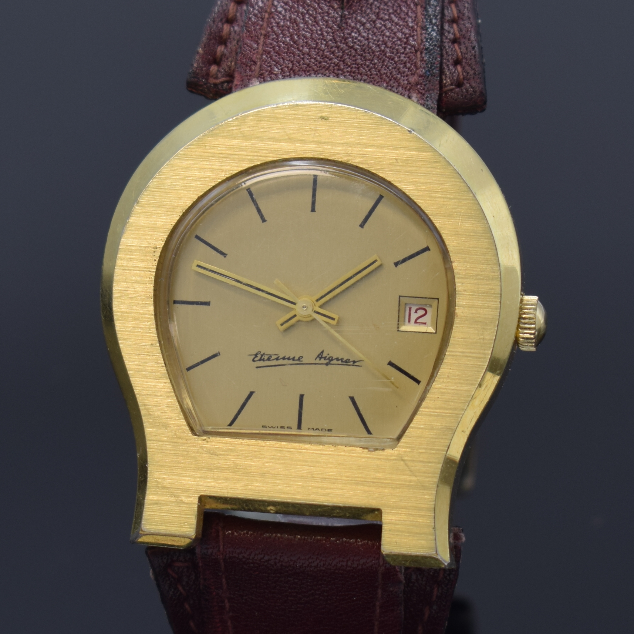 Detail a: ETIENNE AIGNER Herrenarmbanduhr sogenanntes Hufeisen, Automatik, Schweiz um 1980, verg. Geh. inkl. Lederband m. orig. Dornschl., Edelstahlboden ...