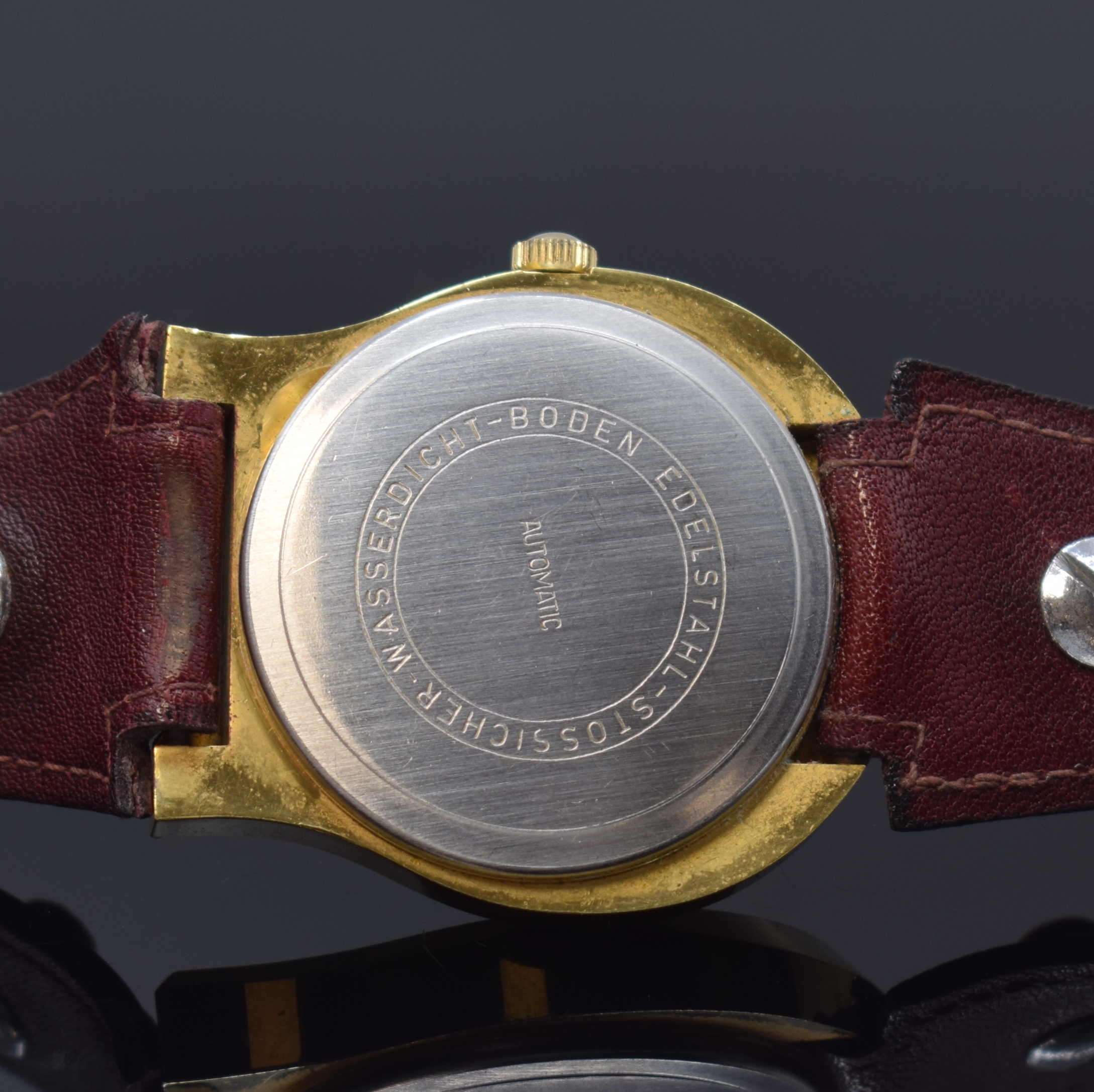 Detail c: ETIENNE AIGNER Herrenarmbanduhr sogenanntes Hufeisen, Automatik, Schweiz um 1980, verg. Geh. inkl. Lederband m. orig. Dornschl., Edelstahlboden ...