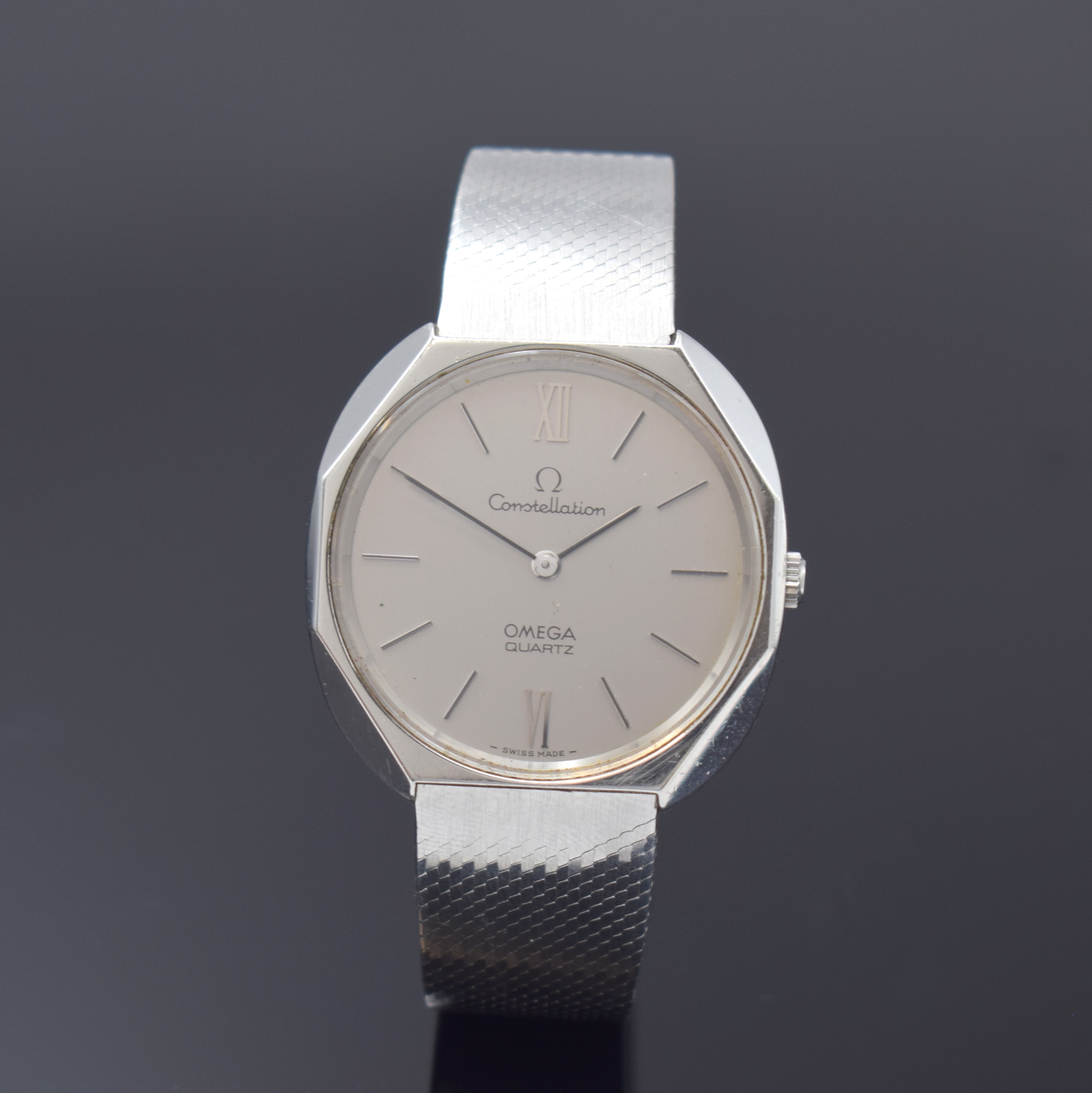 OMEGA Constellation Herrenarmbanduhr Referenz 191.0012/13 - 391.0011, Schweiz um 1980, quarz, Edelstahlgeh. inkl. integr. original Edelstahlband, ...