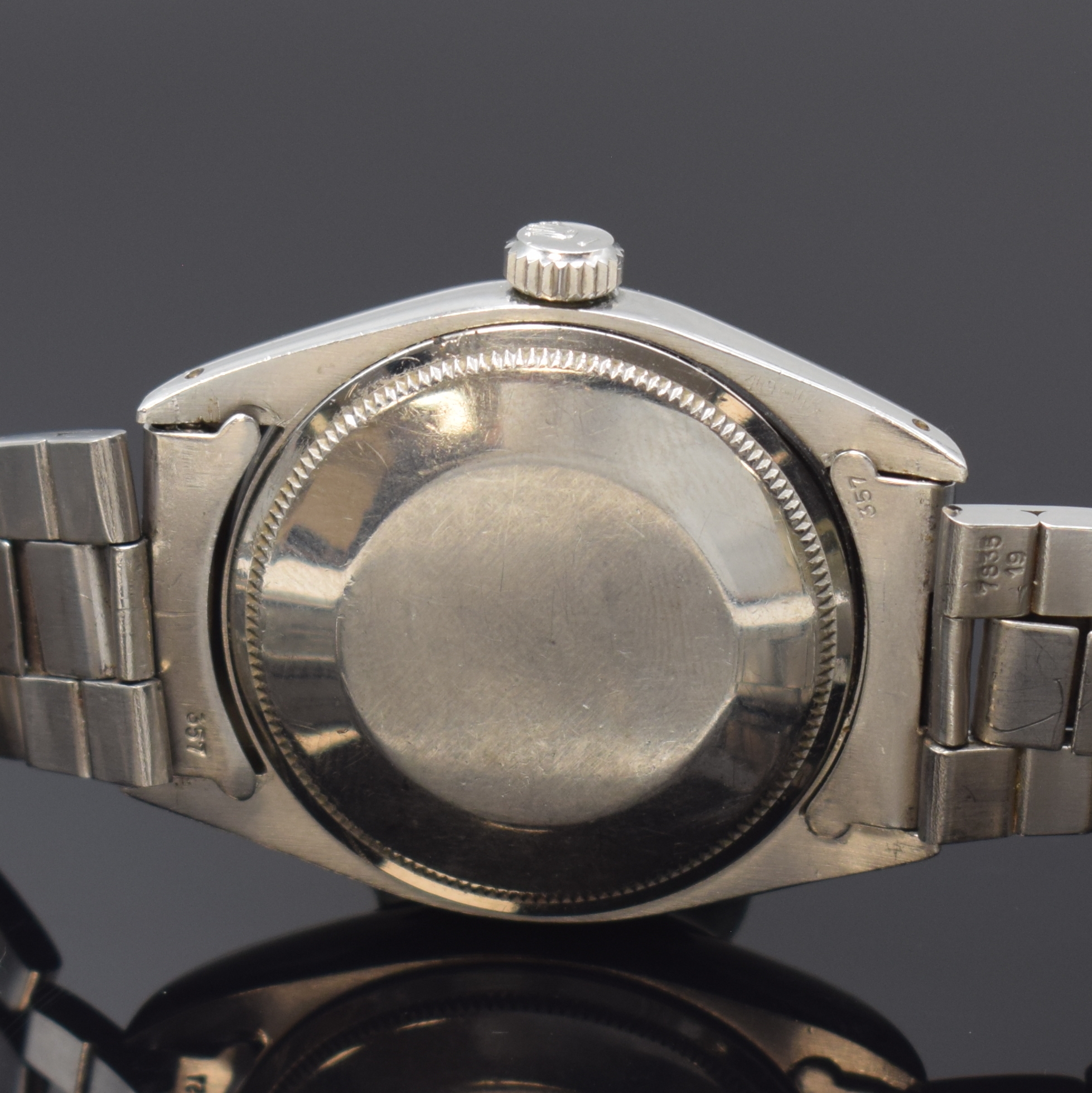 Detail d: ROLEX Herrenarmbanduhr Oyster Perpetual Date Referenz 1500, Automatik, Schweiz lt. Boden-stempel 2. Quartal 1971, Edelstahlgeh. inkl. gefaltetem ...