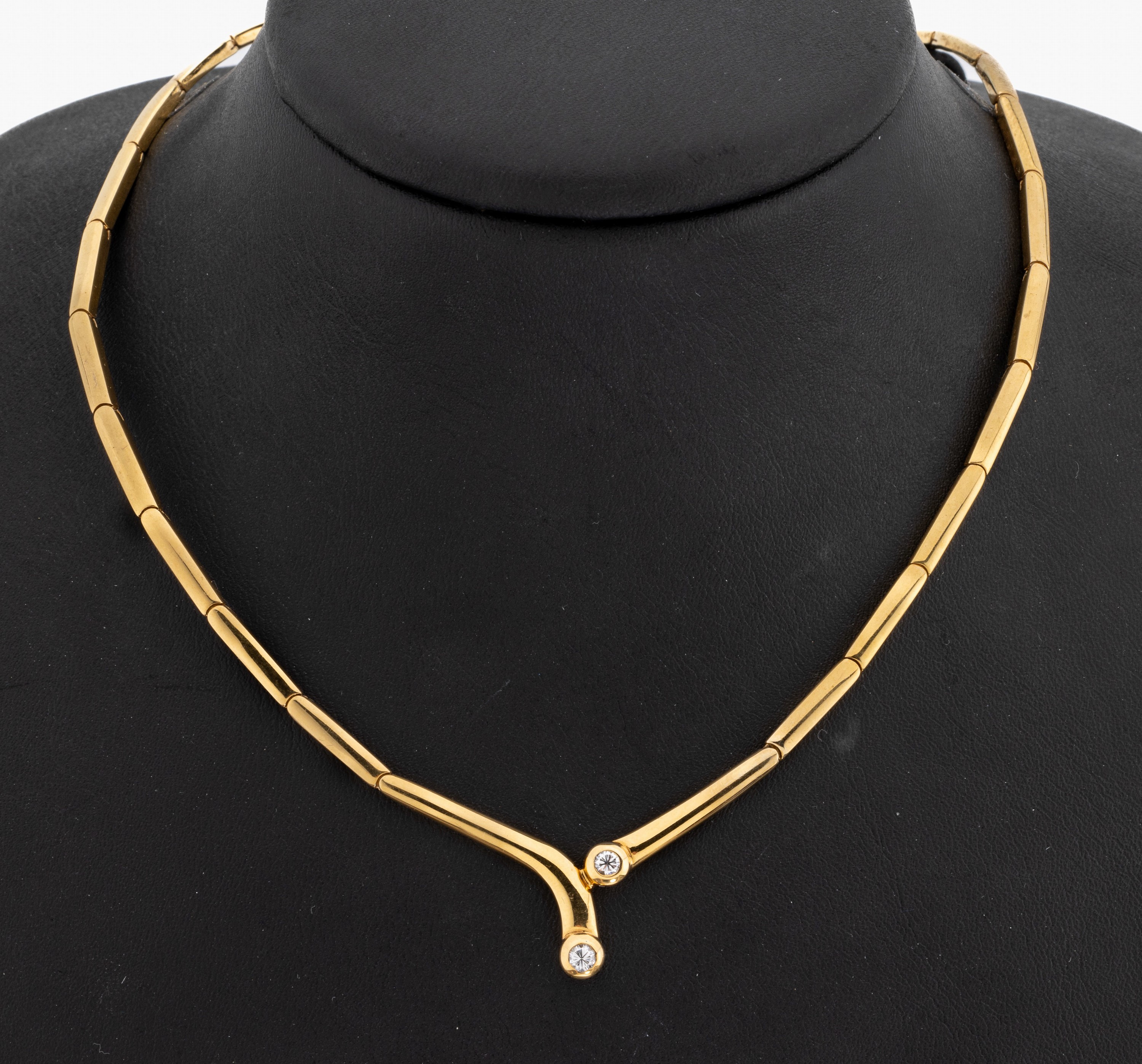 14 kt Gold Brillant-Collier, GG 585/000, 2 Brillanten zus. ca. 0.30 ct (grav.) feines Weiß-Weiß/si, ca. 20.9 g, L. ca. 42 cm, Kastenschloss mit 2 ...