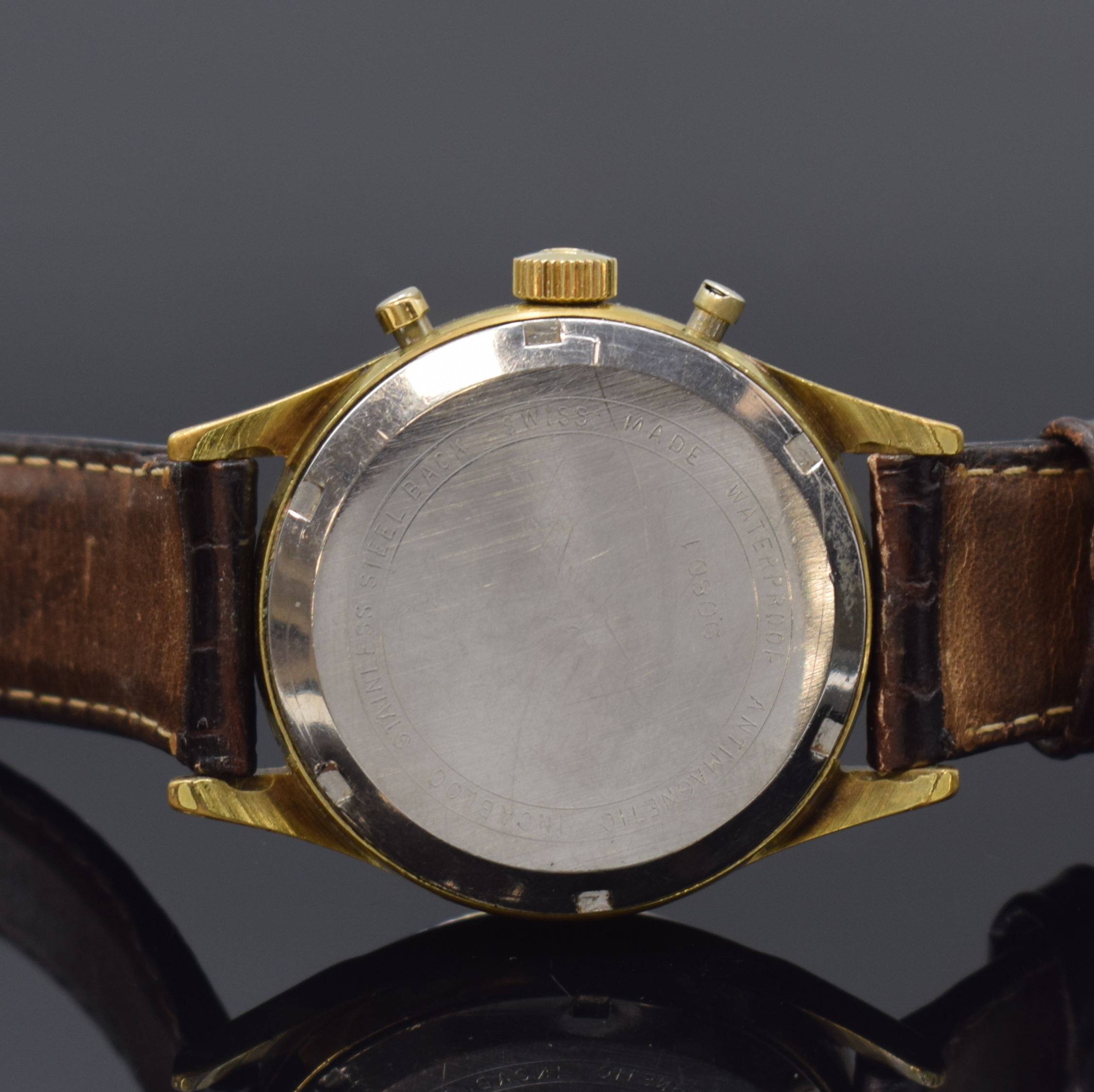 Detail c: HEMA vergoldeter Armbandchronograph, Schweiz um 1965, Handaufzug, Stahlboden verschr., neutr. Lederband m. dopp. Faltschl., schwarzes Zifferbl. m. ...