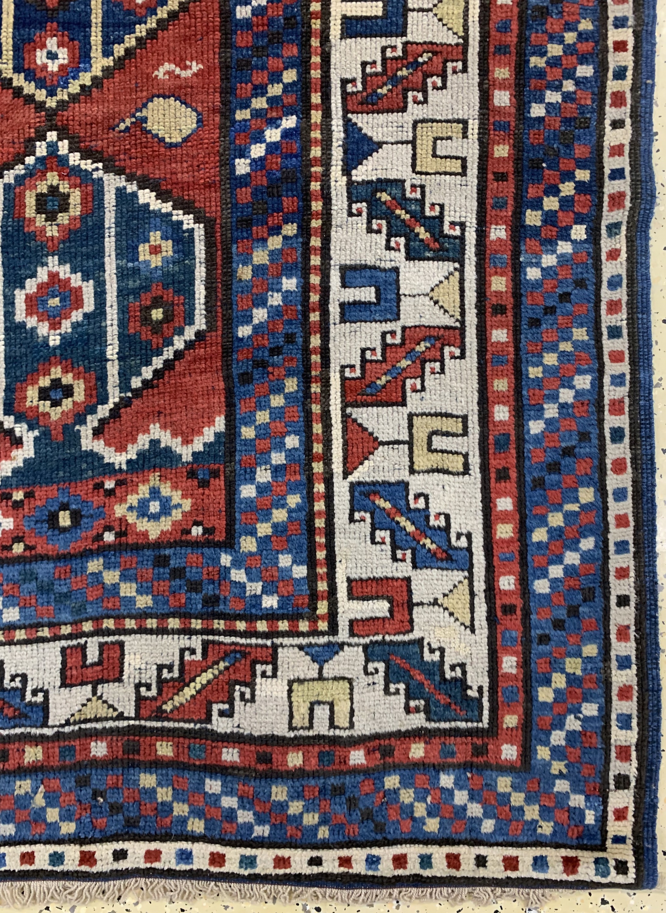 Detail a: Antiker Kazak, Kaukasus, um 1900, Wolle aufWolle, ca. 253 x 110 cm, EHZ: 3