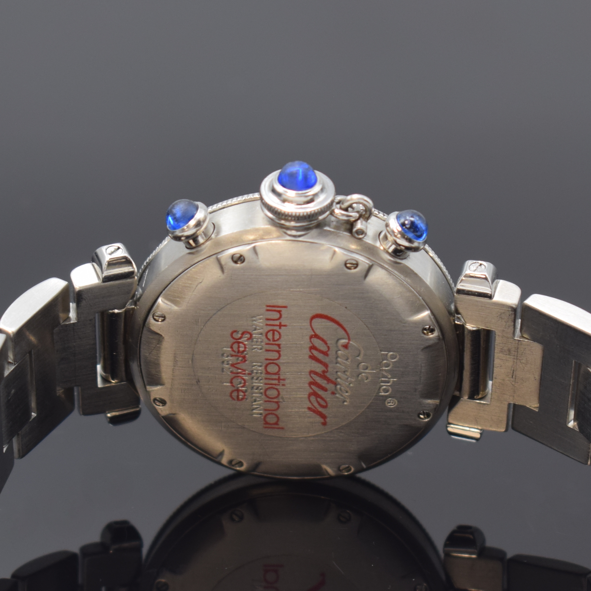 Detail d: CARTIER Pasha Armbandchronograph Referenz 1352, Schweiz um 1999, Edelstahlgeh. inkl. Gliederband m. dopp. Faltschl., Boden 8-fach verschr., Krone ...