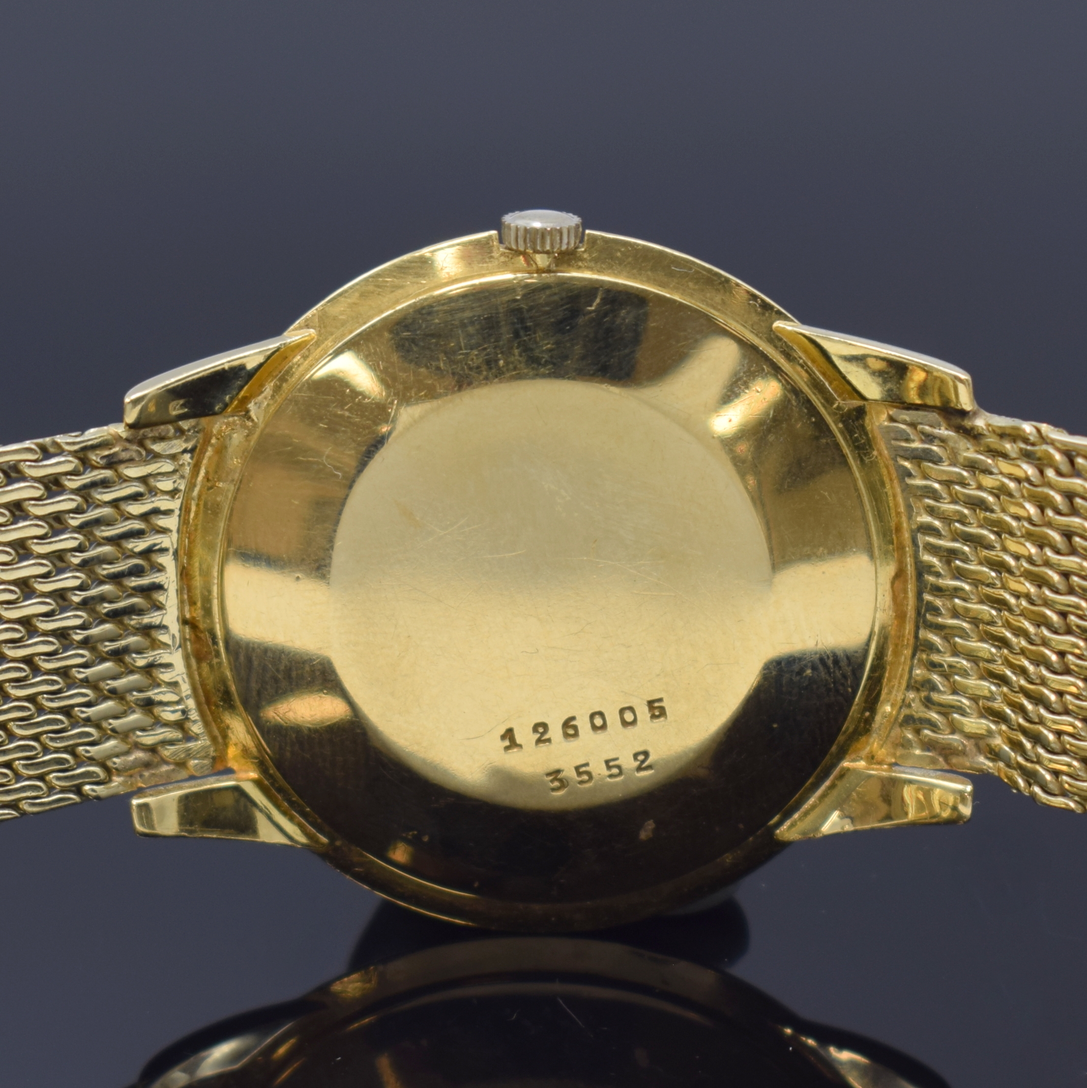 Detail c: BAUME & MERCIER Armbanduhr in GG 750/000 Referenz 3552 an neutralem GG 585/000 Band, Handaufzug, Schweiz um 1960, 3-teil. Geh., Boden und Glasrand ...