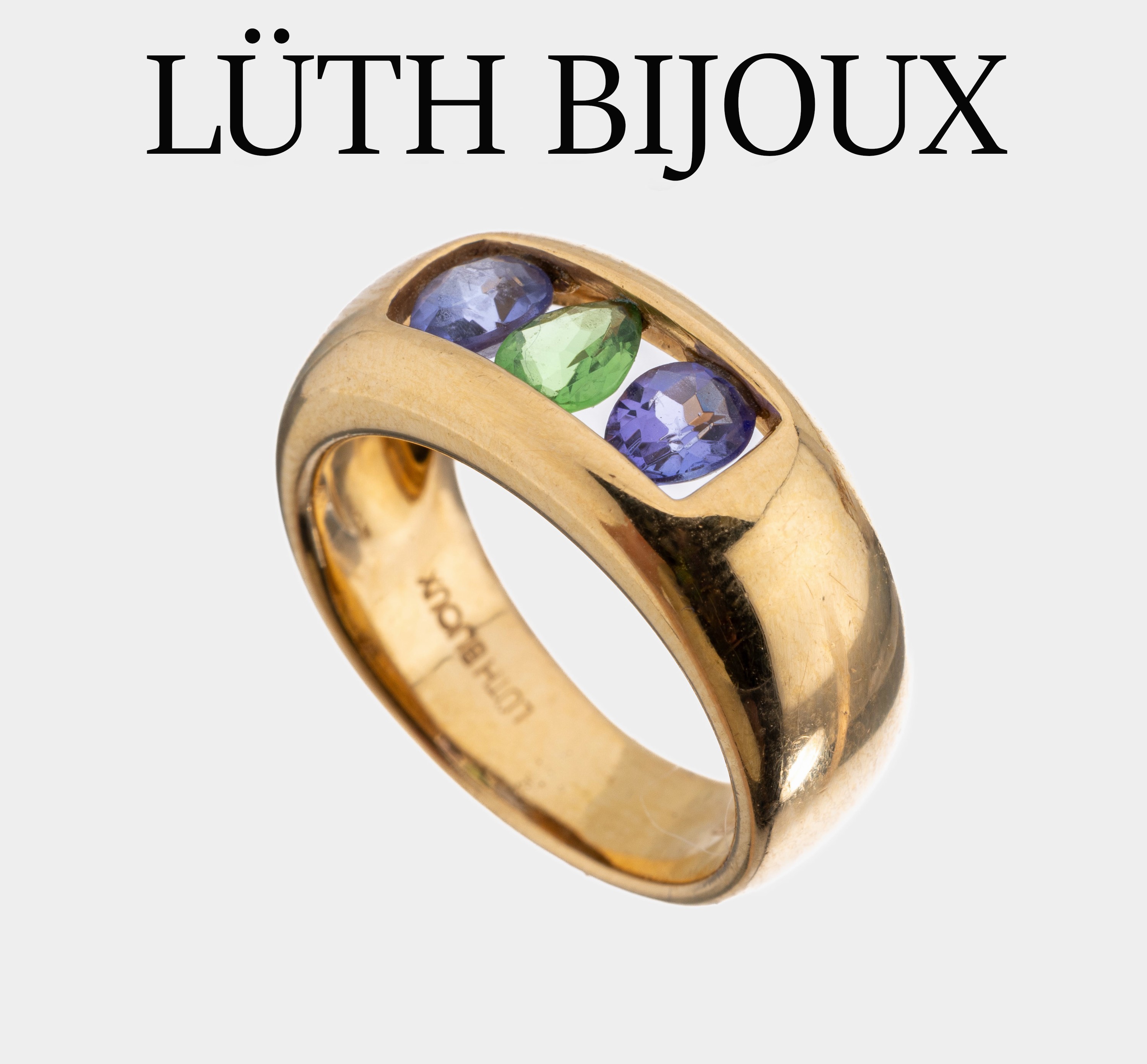 18 kt Gold Farbstein-Ring, GG 750/000, Meistermarke LÜTH BIJOUX, 2 facett. Tansanittropfen und 1 facett. Tsavorithtropfenzus. ca. 1.40 ct, ca. 8.1 ...