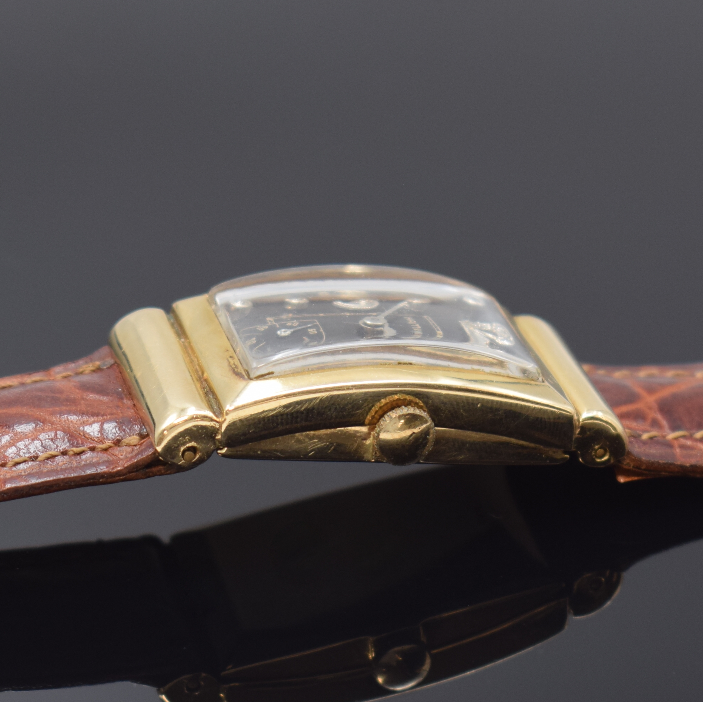 Detail b: HAMILTON Armbanduhr in GG 585/000, USA um 1945, Handaufzug, neutrales Geh., Boden aufgedr., verd. Bandanst., schwarzes mit Diamanten bes. Zifferbl. ...