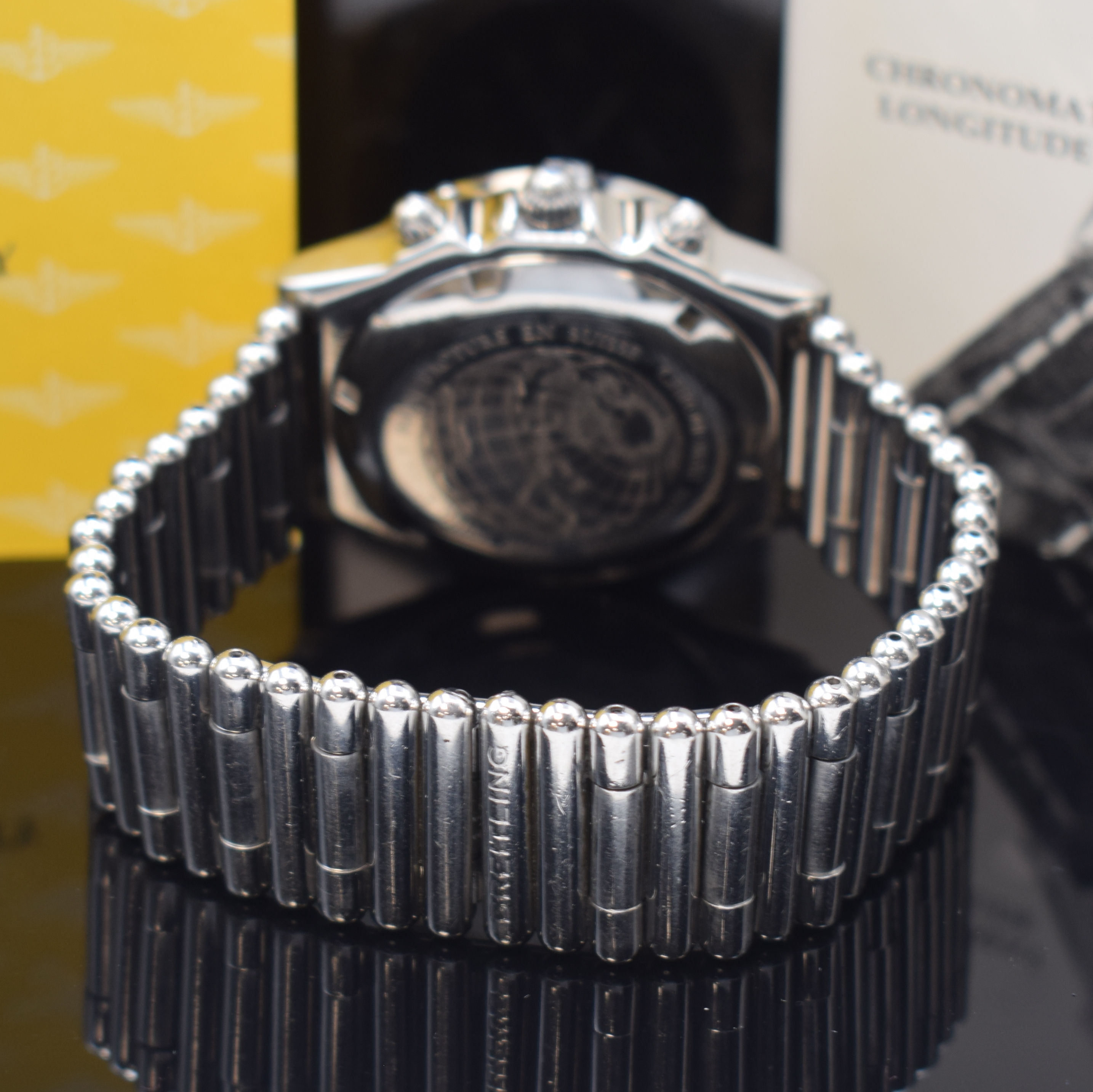 Detail b: BREITLING Armbandchronograph Chronomat Longitude Referenz A20048, Automatik, Schweiz um 1995, Edelstahlgeh. inkl. Roleauxband m. dopp. Faltschl., ...