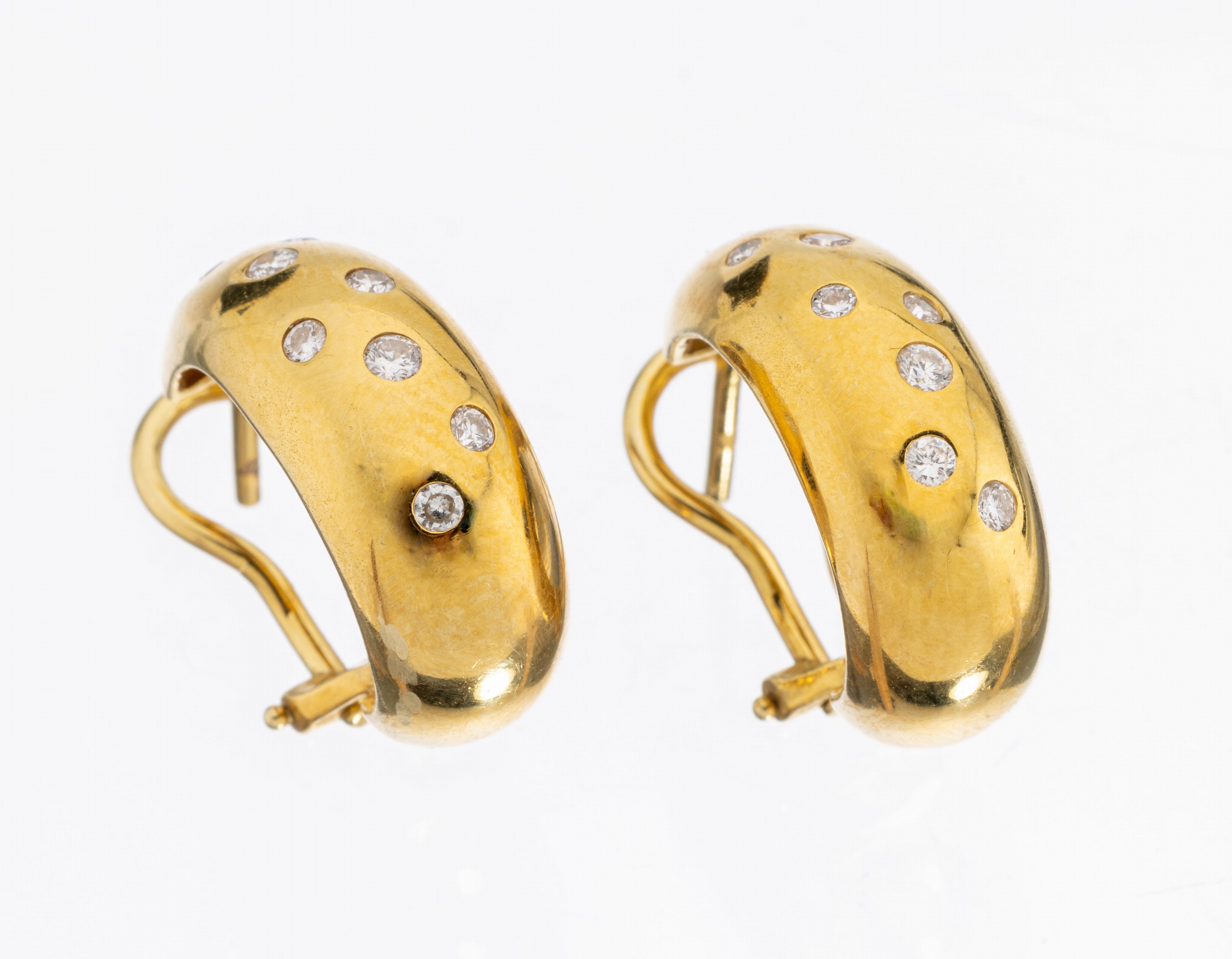 Paar 14 kt Gold Brillant-Halbcreolen, GG 585/000 gepr., 16 Brillanten zus. ca. 0.20 ct Weiß/si, ca. 7.5 g, Clipsbrisuren, L. ca. 2 cm