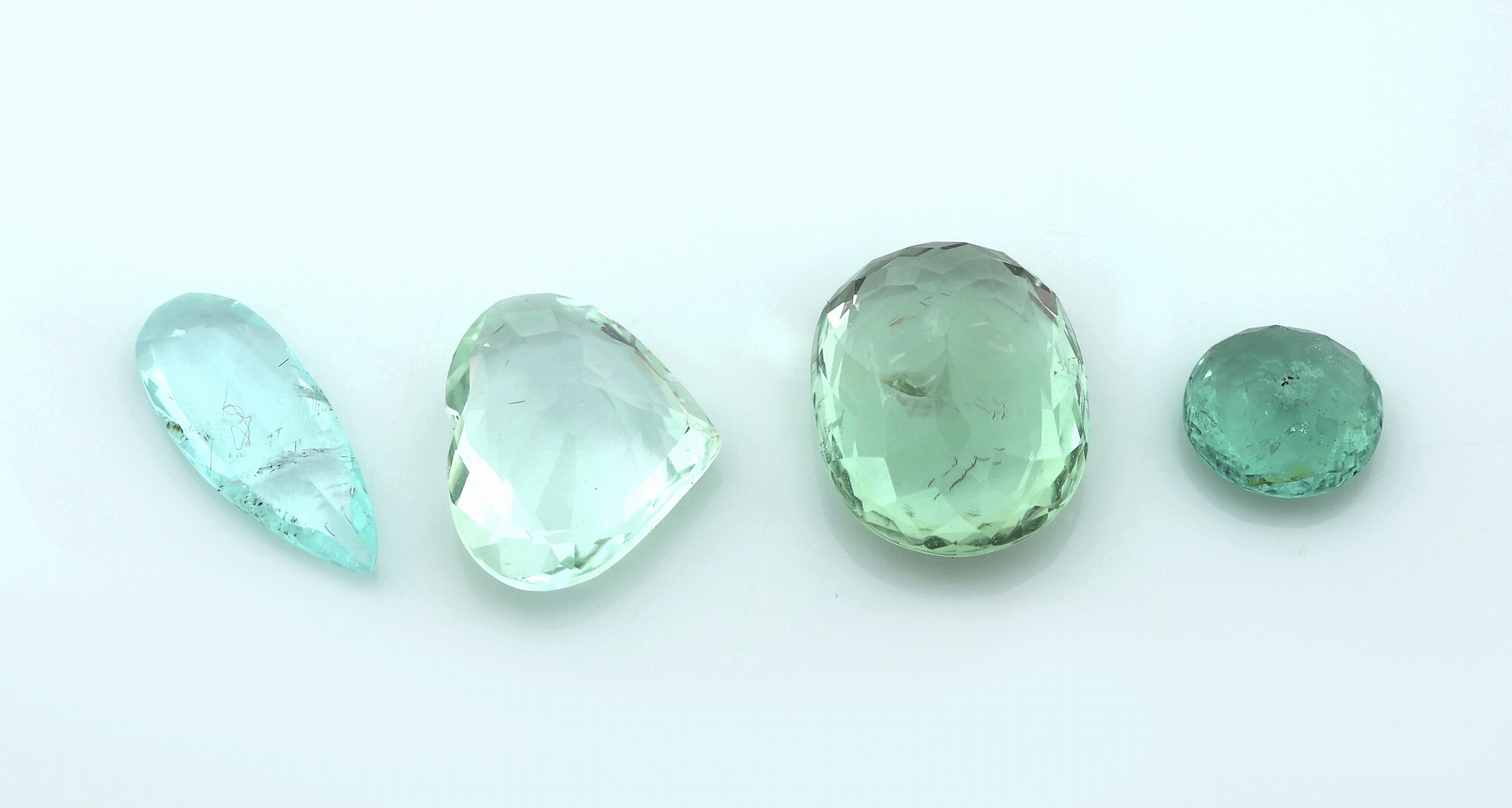 Detail a: Lot 4 lose Turmaline, zus. 9.47 ct, facett., in versch. Farbnuancen und Schliffen, lt. AIG-Expertise mit Handelsnamen Paraiba