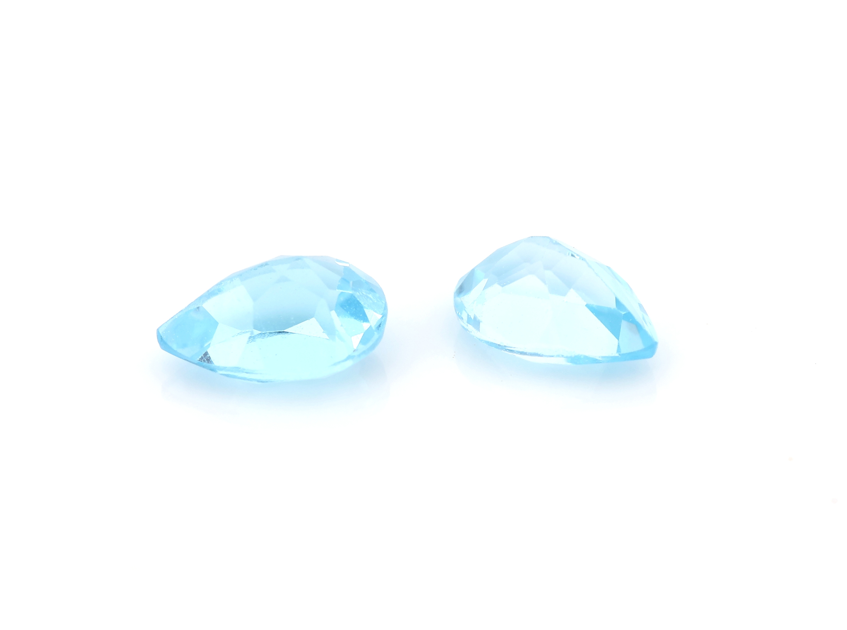 Detail b: Lot 11 lose facett. Topase, zus. 9.66 ct, facett. Tropfen in versch. Größen und Farbnuancen