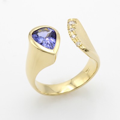 Image Ring mit Tansanit und Brillanten, GG 750/000, offen gearb. u. z.T. sat., Tansanittropfen ...