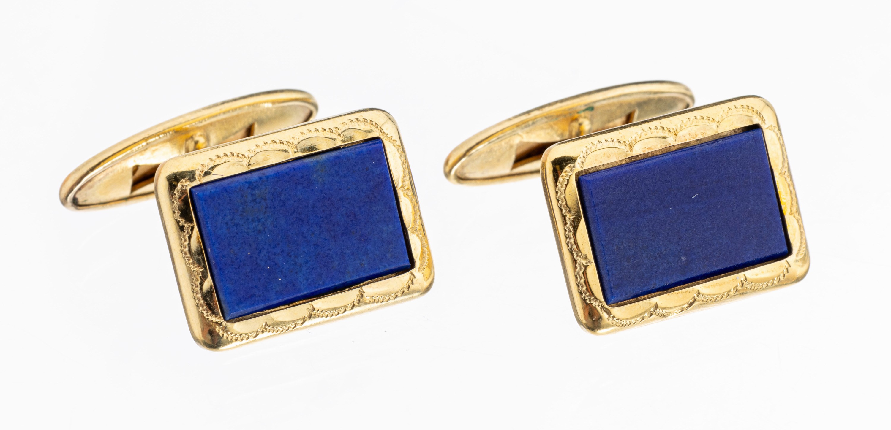 Paar Lapislazuli-Manschettenknöpfen, 835er Silber verg., rechteckige Lapislazuliplatten, ungrav., Girlandengravur, ca. 8.3 g