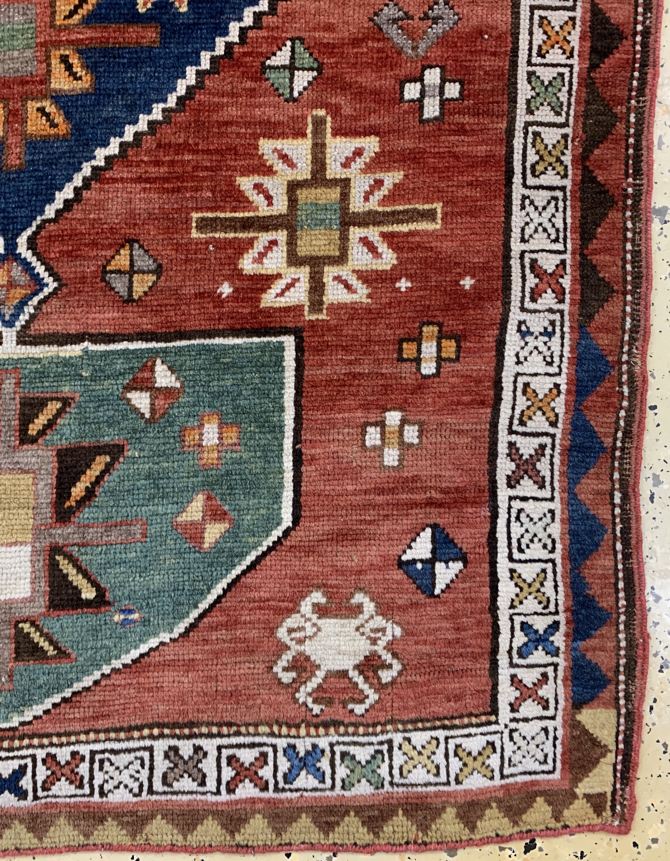 Detail a: Kazak alt, Kaukasus, datiert 1344(1923), Wolle auf Wolle, ca. 184 x 110 cm, EHZ: 3(ohneFransen)