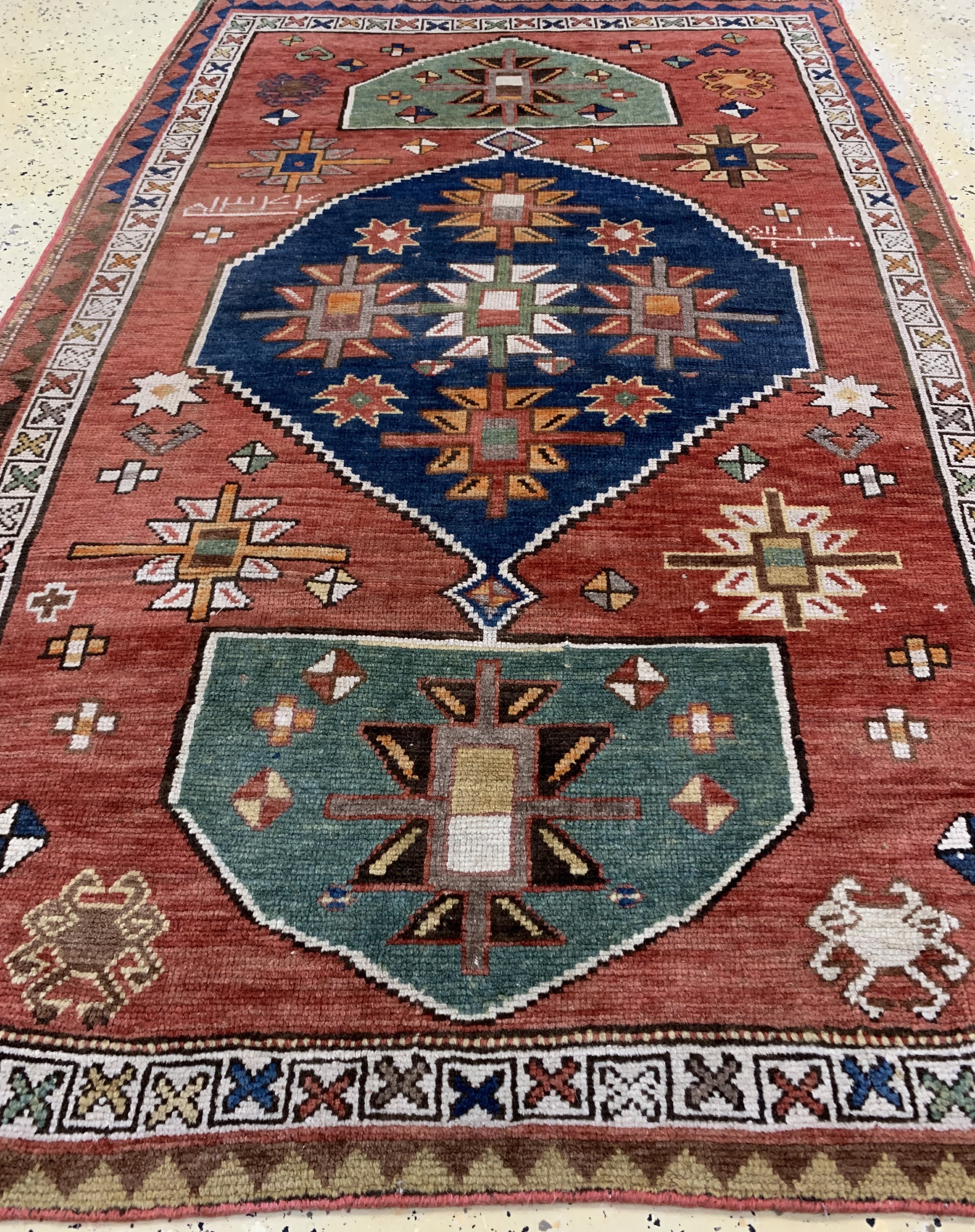 Detail d: Kazak alt, Kaukasus, datiert 1344(1923), Wolle auf Wolle, ca. 184 x 110 cm, EHZ: 3(ohneFransen)
