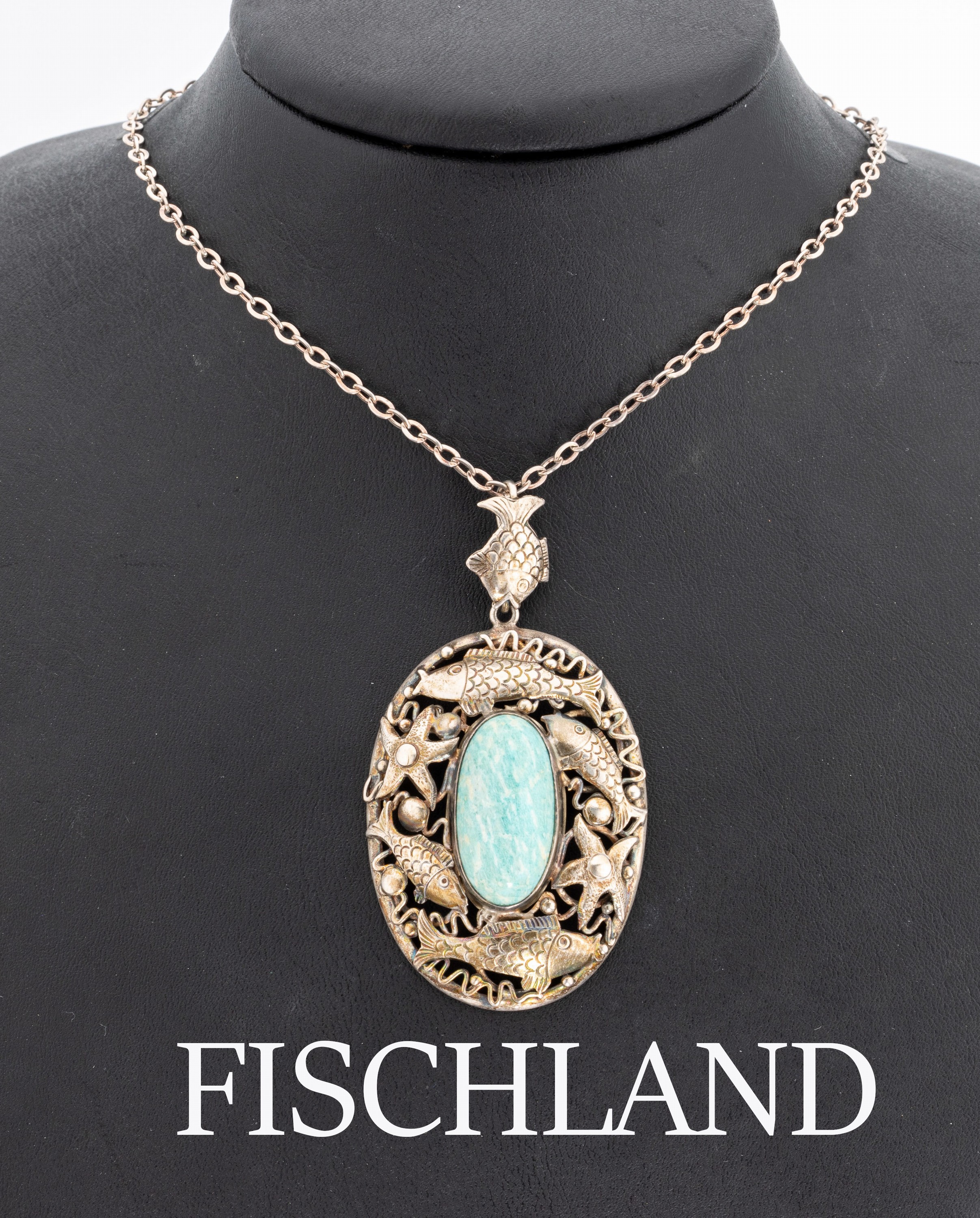 FISCHLAND Amazonit-Anhänger, um 1940/50, 925er Silber, mittig ovaler Amazonit-Cabochon,Fassung mit Fischen und Seesternen, Meistermarke Georg ...