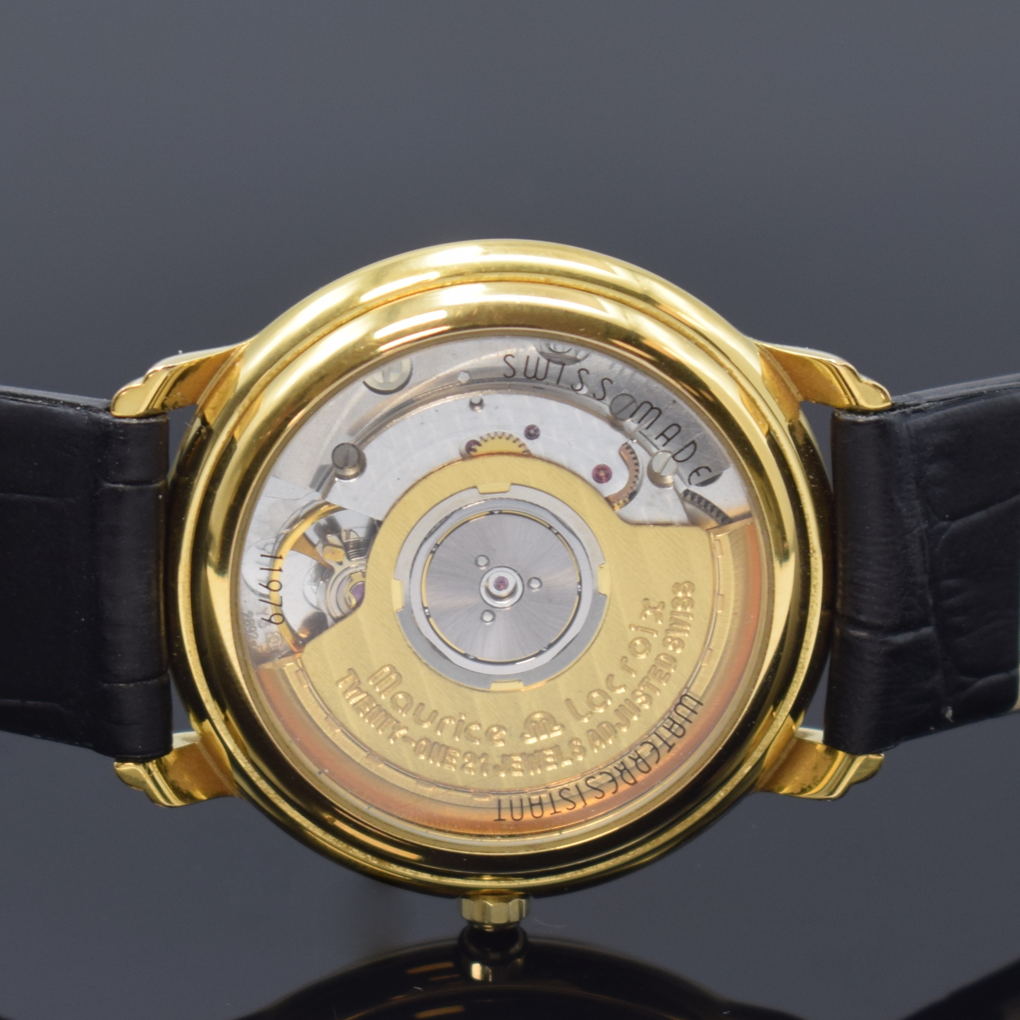 Detail d: MAURICE LACROIX elegante Armbanduhr mit Telemeterskala, Schweiz um 1990, Automatik, verg., beids. vergl. Geh., Boden aufgedr., weißes Zifferbl., ...