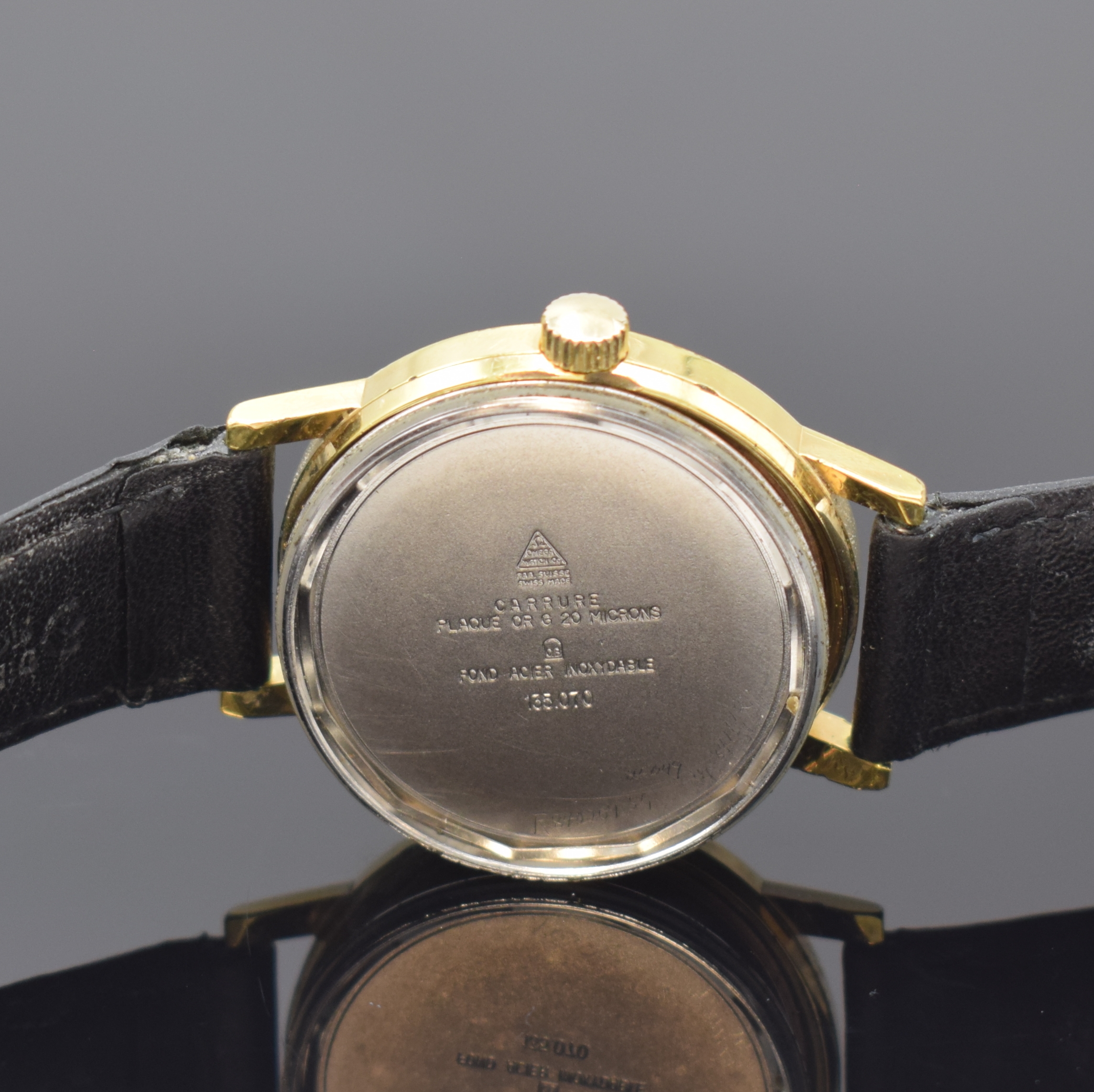 Detail e: OMEGA Geneve Herrenarmbanduhr Referenz 135.070, Schweiz um 1969, Handaufzug, verg. Geh., Stahlboden verschr., gold. Zifferbl., gold. Indizes u. ...