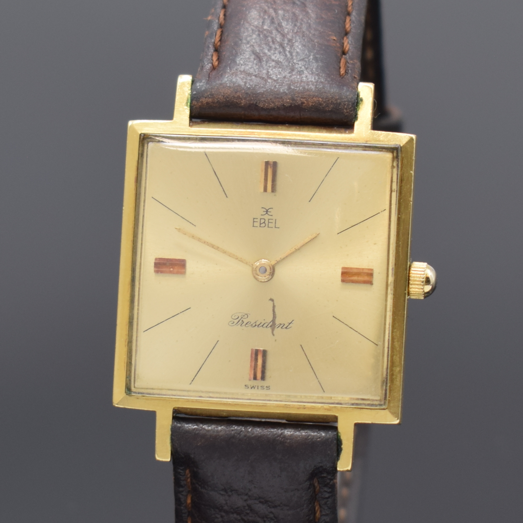 Detail a: EBEL President Armbanduhr in GG 750/000, Schweiz um 1965, Handaufzug, Boden aufgedr., gold. Zifferbl. m. aufgel. Ind., gold. Zeiger, Kal. 97, M. ca. ...