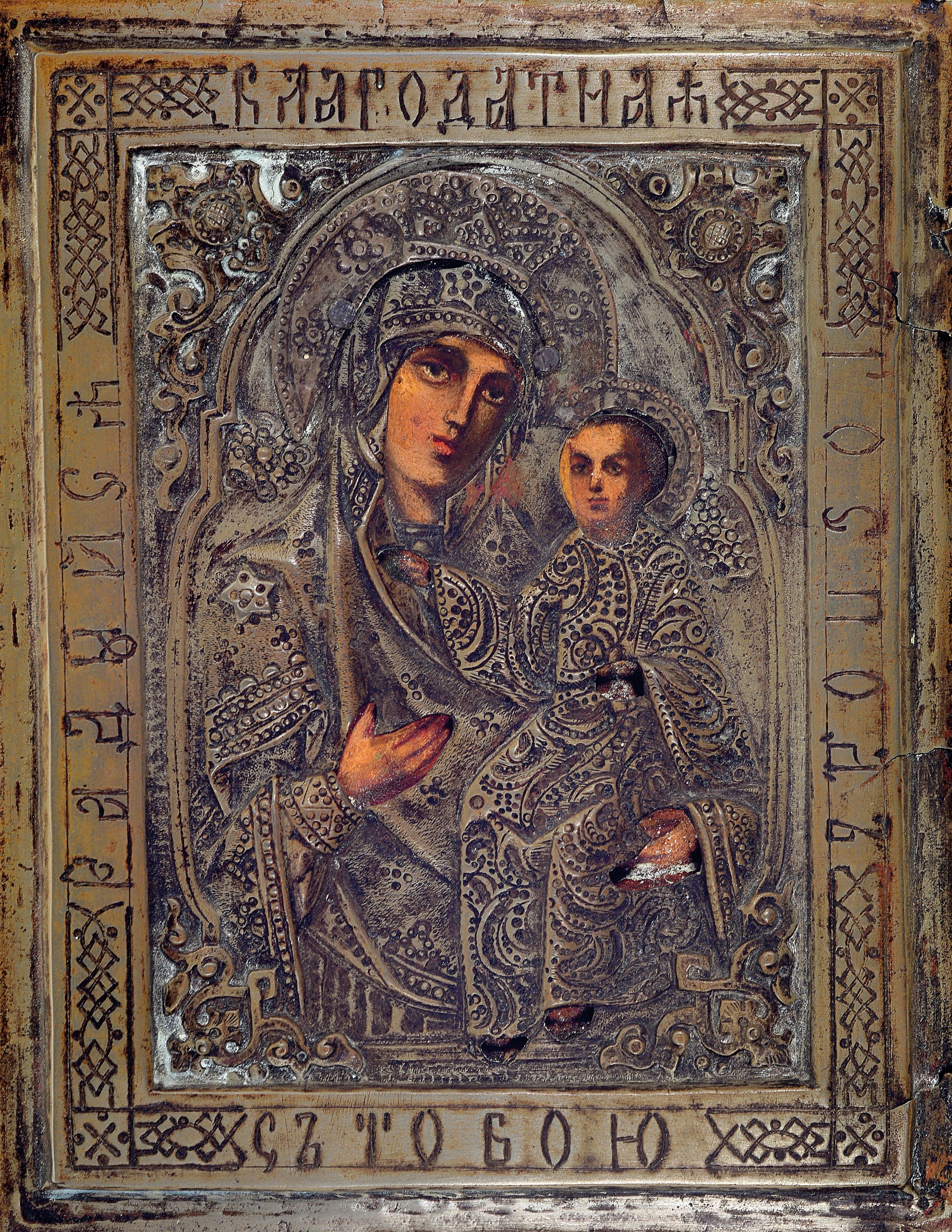 Ikone, Russland, 2.Hälfte 19.Jh., Mutter Gottes mit Christuskind, Tempera auf Holz, reich geprägtes Metalloklad, ca. 15x12 cm