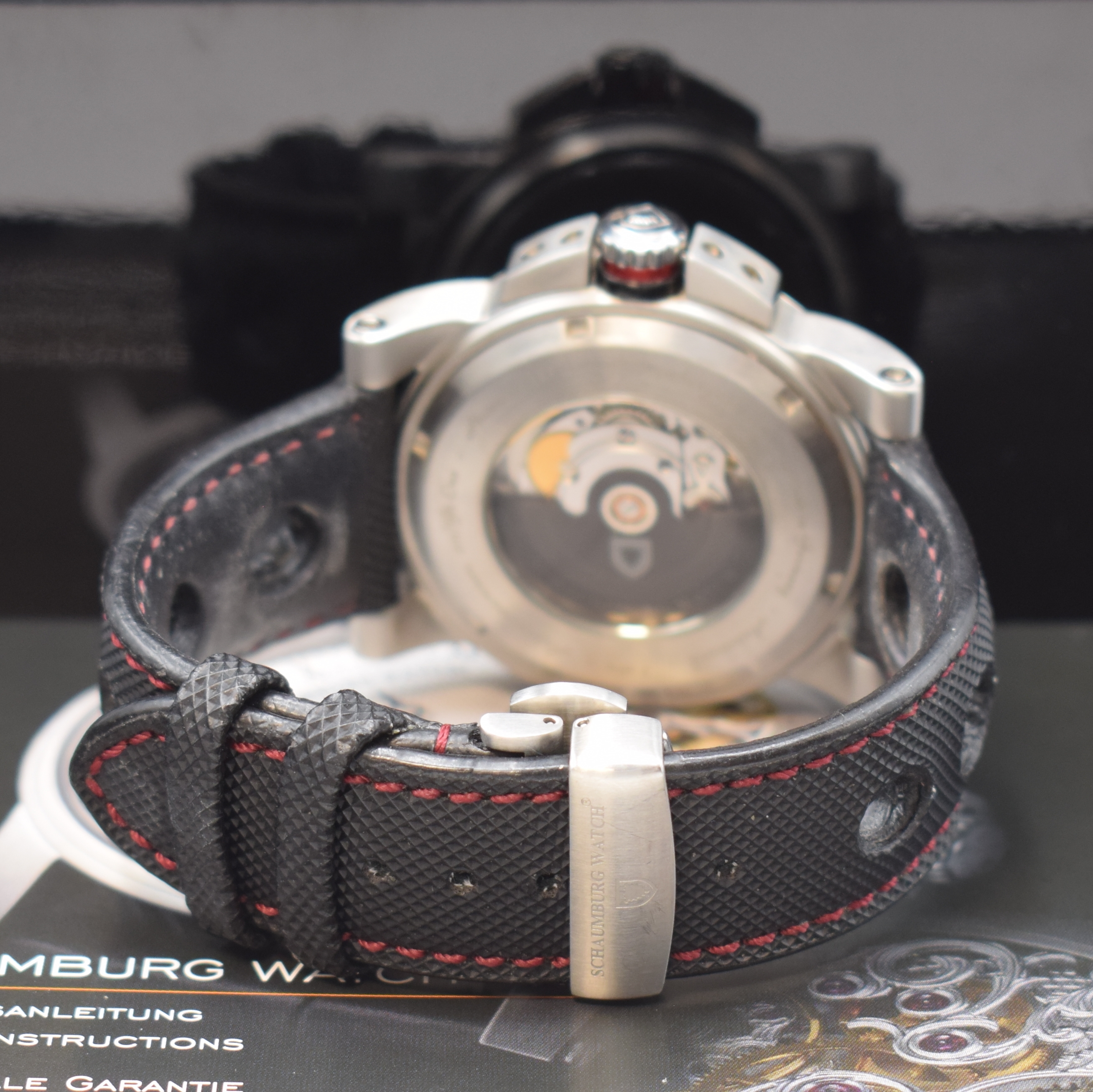 Detail b: SCHAUMBURG WATCH Herrenarmbanduhr GT RaceClub Referenz 011/Gt One, Automatik, Edelstahlgeh. inkl. orig. Band m. dopp. Faltschl., beids. vergl., Boden ...