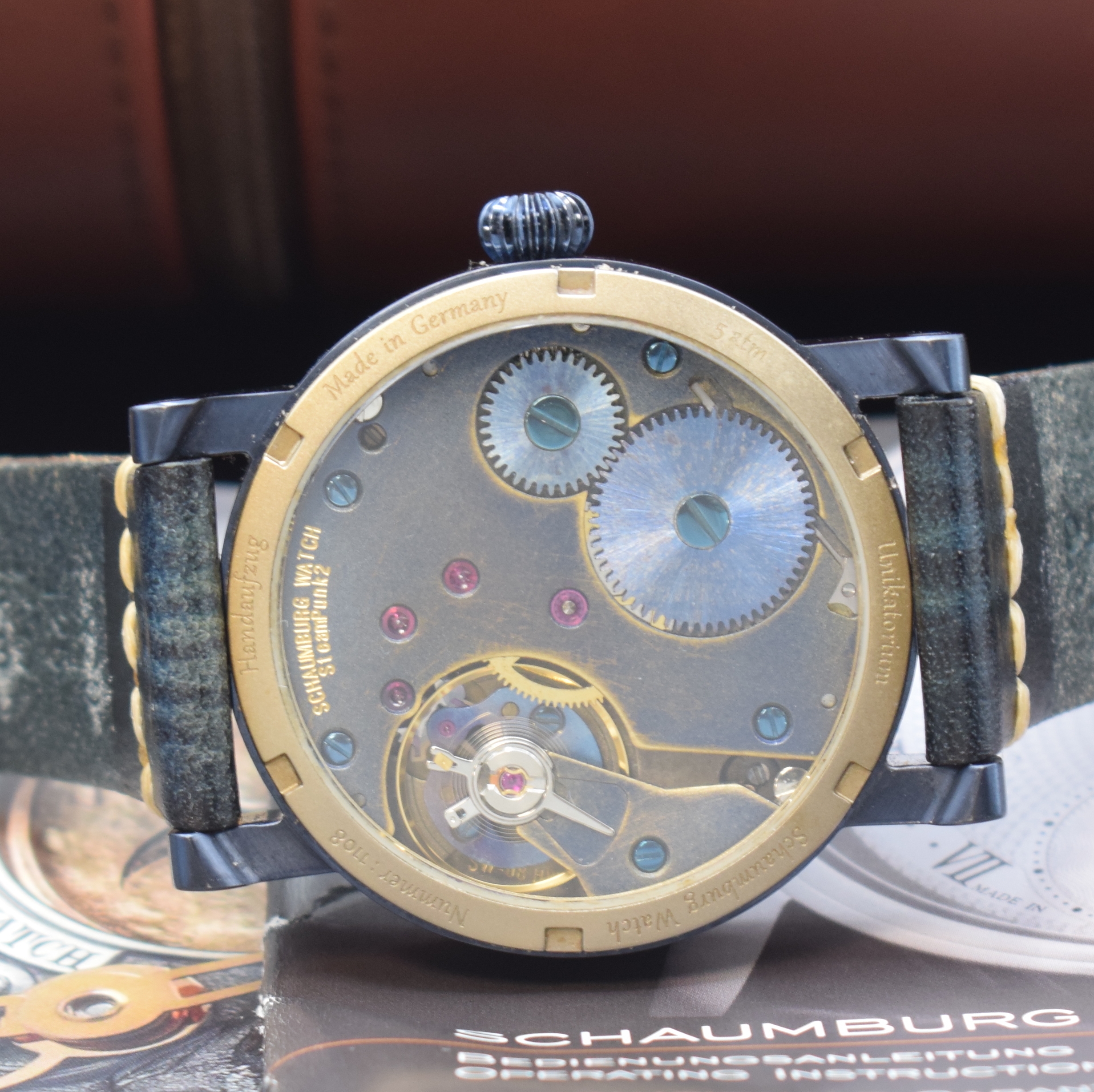 Detail d: SCHAUMBURG WATCH Unikatorium SteamPunk 2, Handaufzug, gebl. Edelstahlgeh. inkl. orig. Lederband m. orig. Dornschl., beids. vergl., Boden verschr., ...