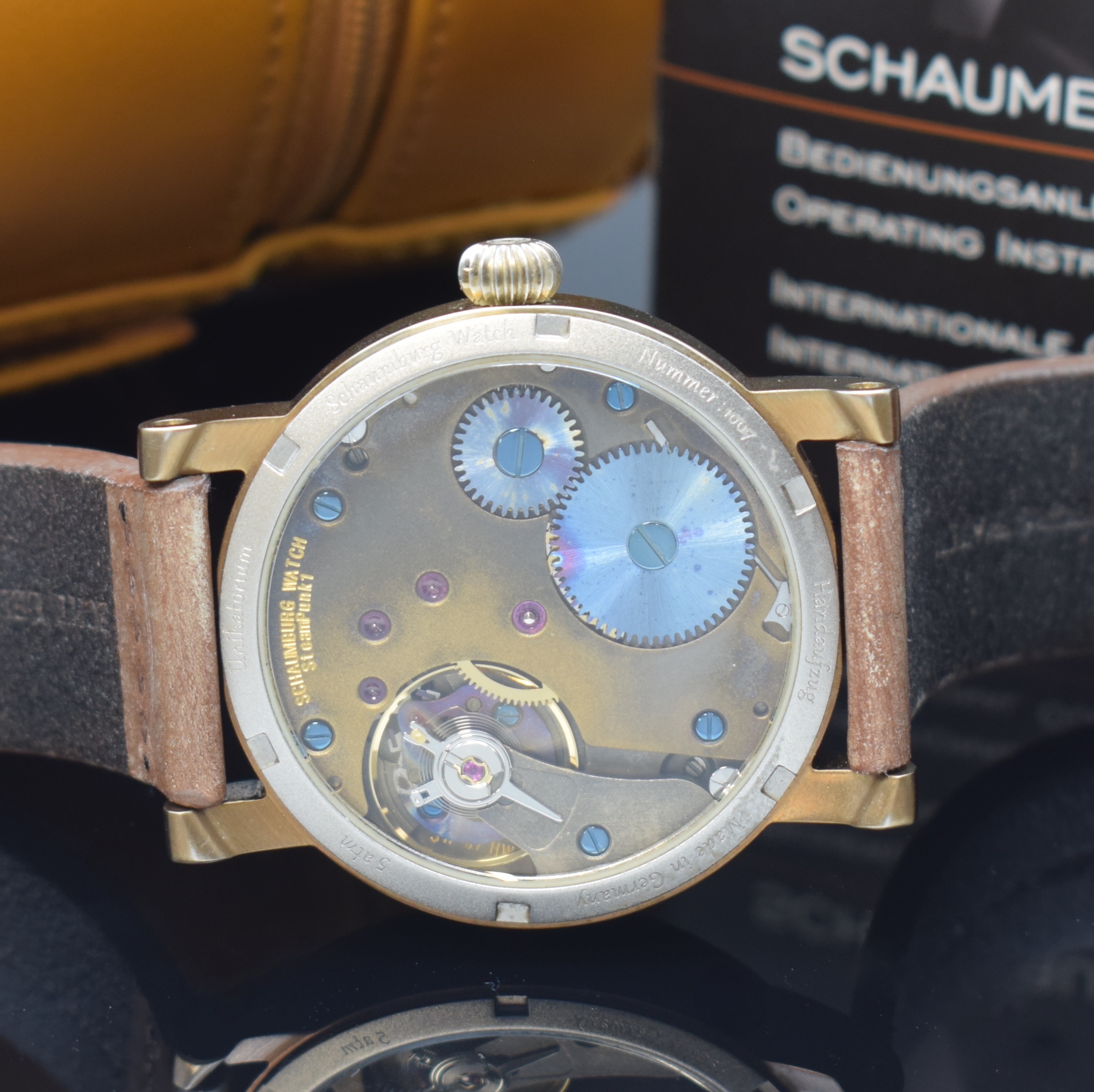 Detail d: SCHAUMBURG WATCH Unikatorium SteamPunk 1, Handaufzug, bronzefarb. Edelstahlgeh. inkl. orig. Lederband m. orig. Dornschl., beids. vergl., Boden ...