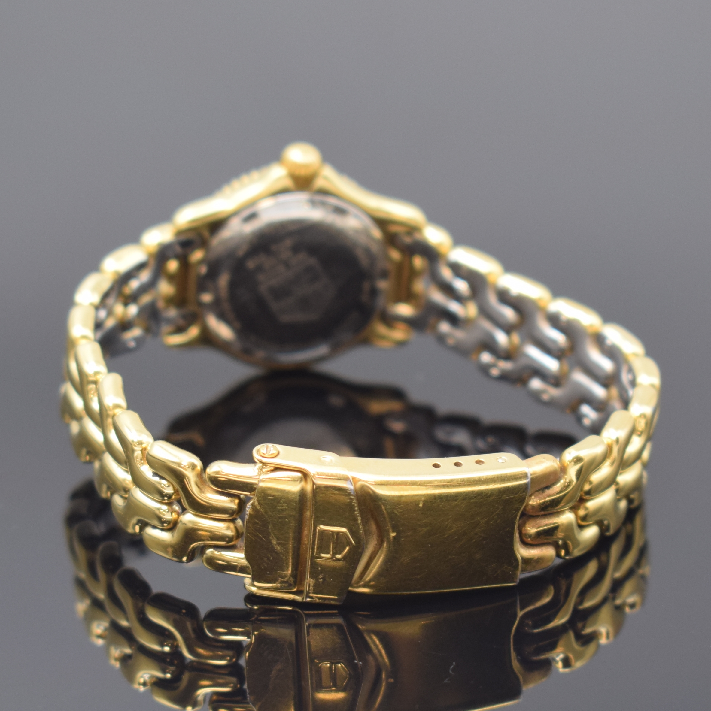 Detail b: TAG HEUER Damenarmbanduhr Referenz S94.708M,Schweiz um 1995, quarz, verg. Geh., inkl. Gliederband m. Faltschl., Boden verschr., Lünette m. 60er ...