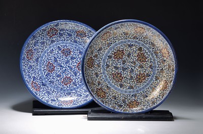 Image Two large plates, Japan, around 1900, porcelain, blue underglaze painting, heightened ...