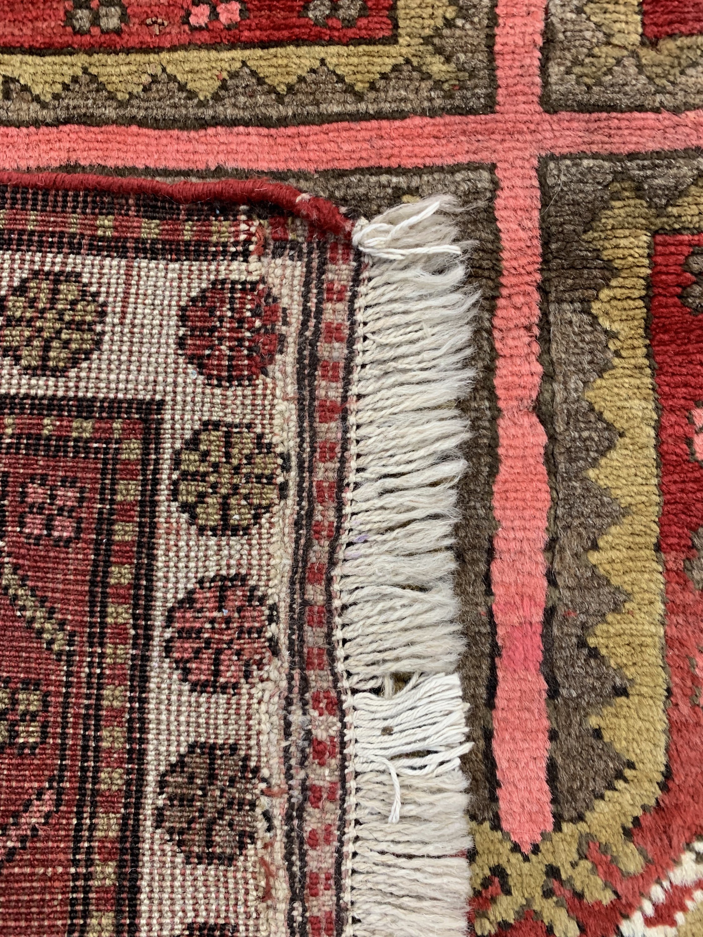 Detail d: Antiker Kazak, Kaukasus, um 1900, Wolle aufWolle, ca. 180 x 115 cm, leicht verfärbt, EHZ:3, restauriert