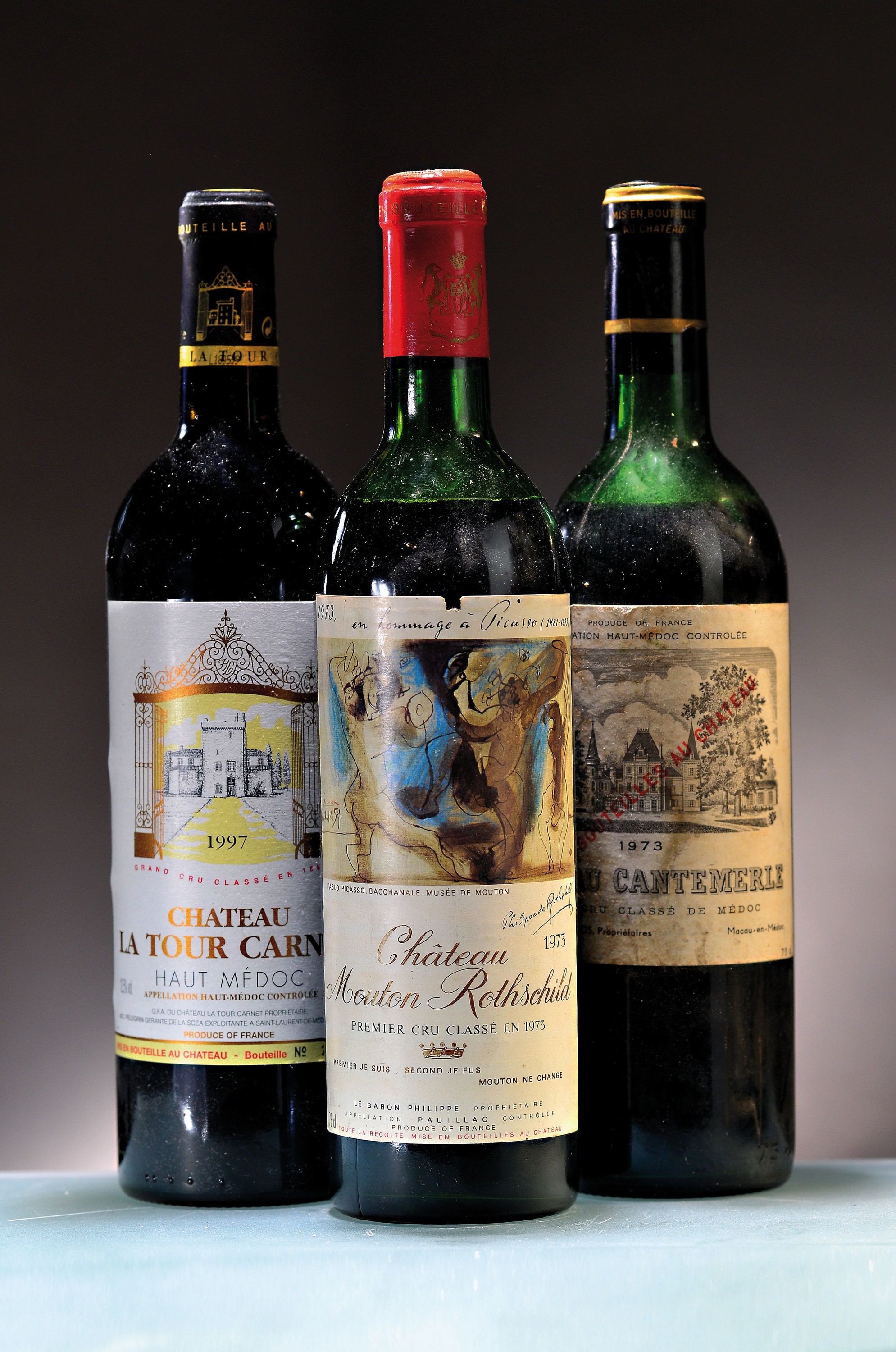 3 Flaschen Bordeaux-Weine, 1973 Chateau Mouton Rothschild, 1973 Chateau Cantemerle, Medoc; 1997 Chateau La Tour Carnet, Haut Medoc, 750ml, nicht ...