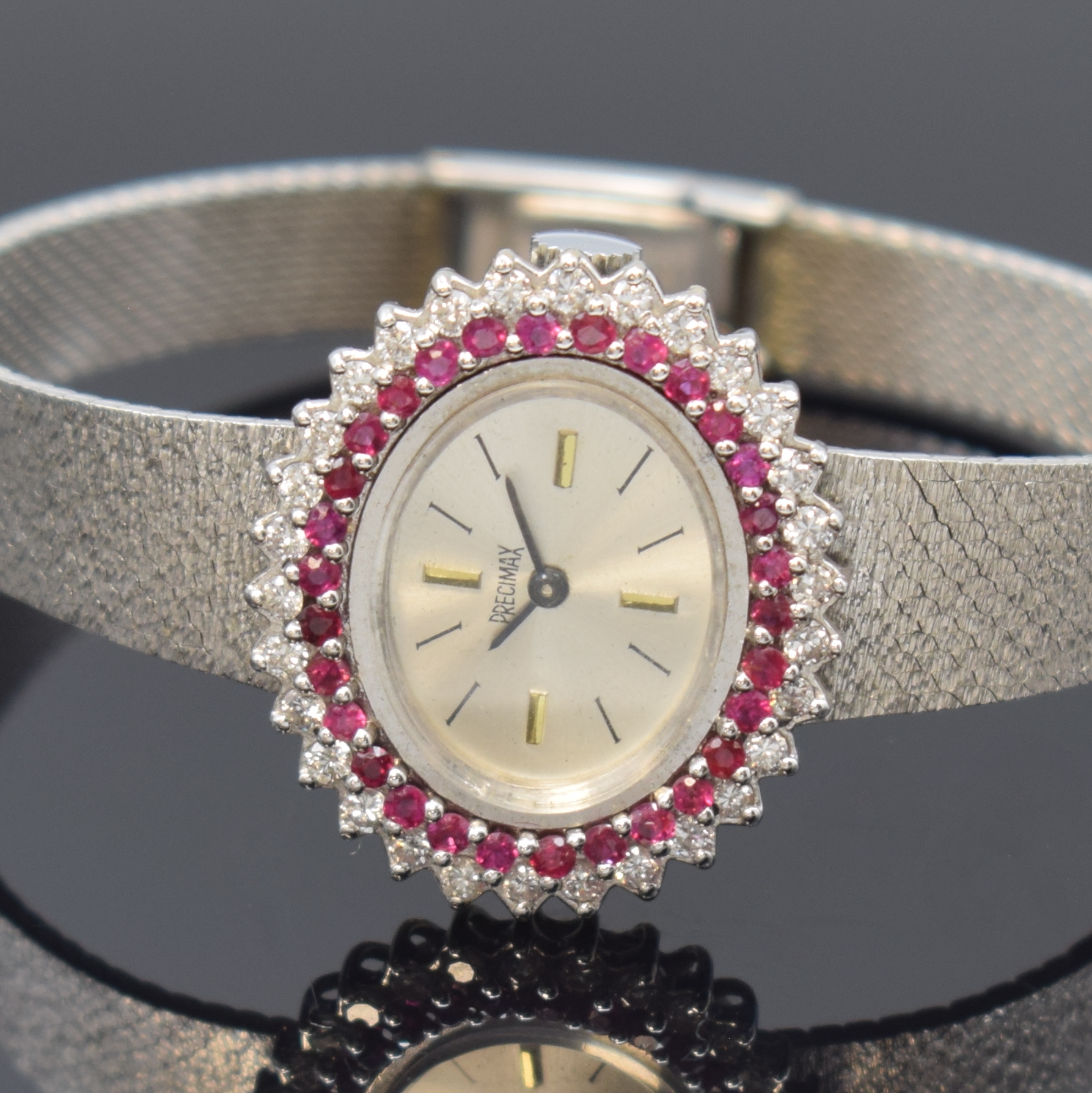 Detail a: PRECIMAX Damenarmbanduhr in WG 585/000 mit Diamanten und Rubinen, Schweiz um 1970, Handaufzug, Boden aufgedr., Lünette aufw. m. Diamanten u. Rubinen ...