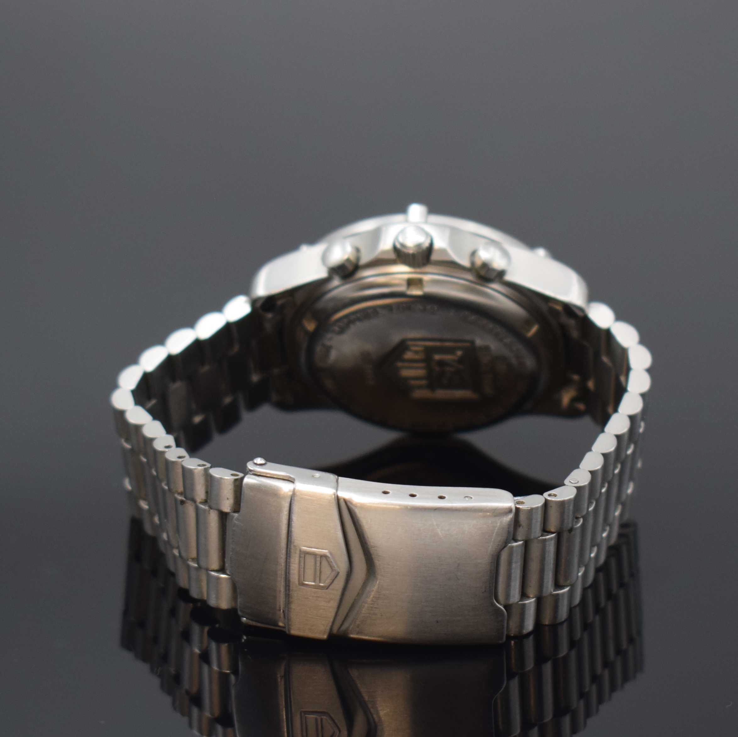 Detail b: TAG HEUER Professional Herrenarmbanduhr in Stahl Referenz CE1111, Schweiz um 1995, quarz, Boden u. Krone verschr., orig. Gliederband m. Faltschl., ...