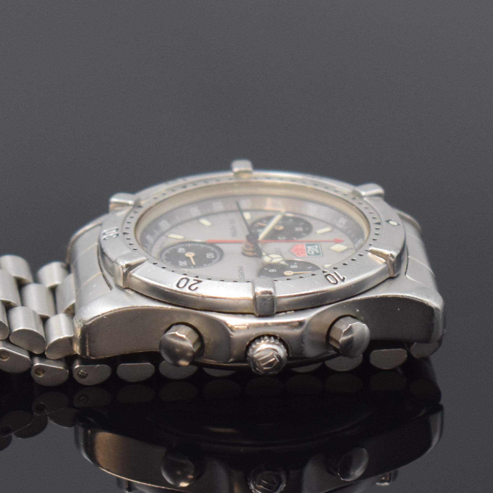Detail c: TAG HEUER Professional Herrenarmbanduhr in Stahl Referenz CE1111, Schweiz um 1995, quarz, Boden u. Krone verschr., orig. Gliederband m. Faltschl., ...