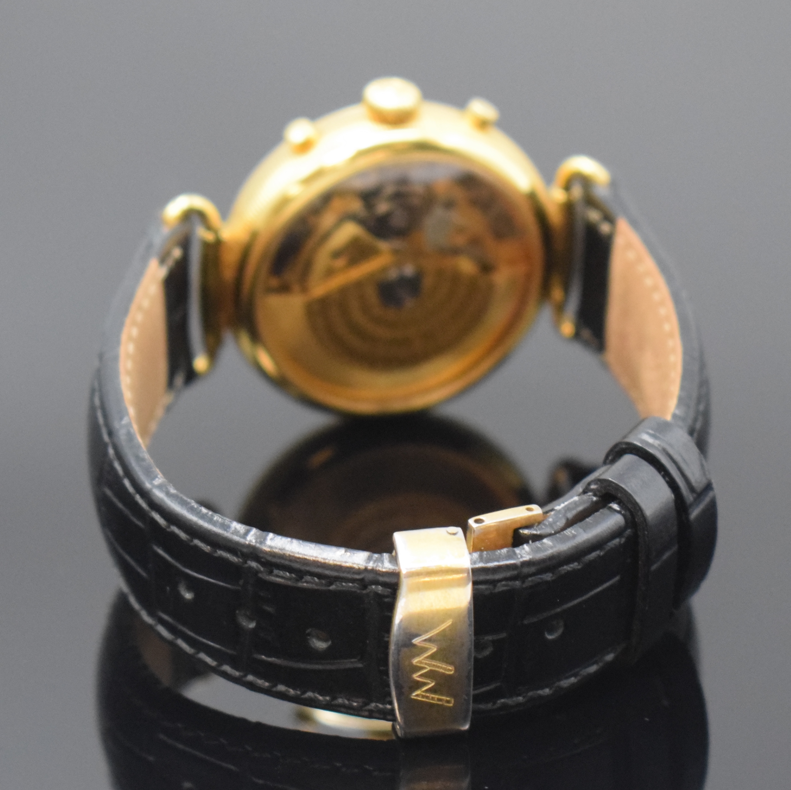 Detail b: Herrenarmbanduhr mit Chronograph und Vollkalender, Schweiz um 1995, Automatik, beids. vergl. Geh., Boden aufgedr., Korrekturdrücker seitl. im Geh. ...