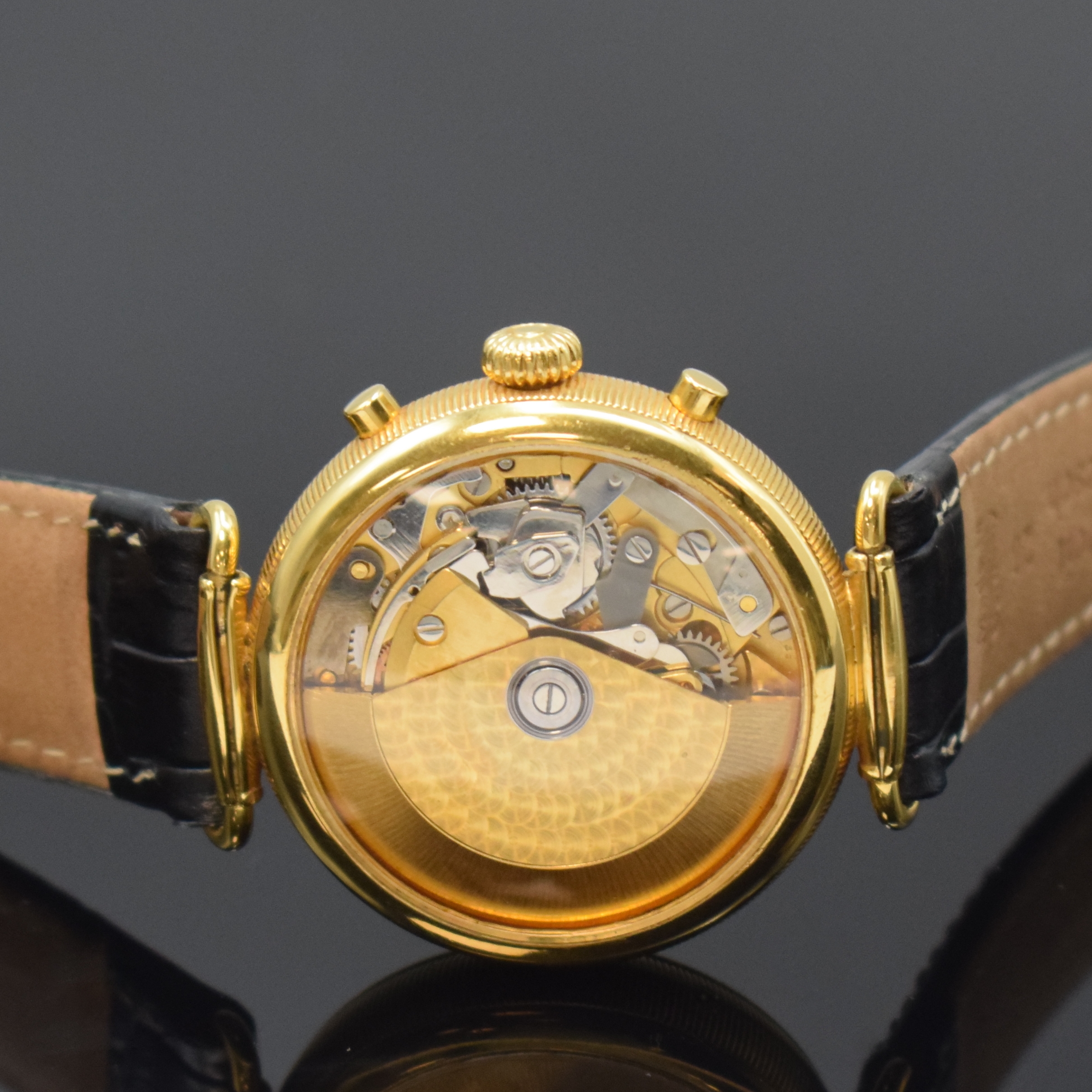 Detail e: Herrenarmbanduhr mit Chronograph und Vollkalender, Schweiz um 1995, Automatik, beids. vergl. Geh., Boden aufgedr., Korrekturdrücker seitl. im Geh. ...