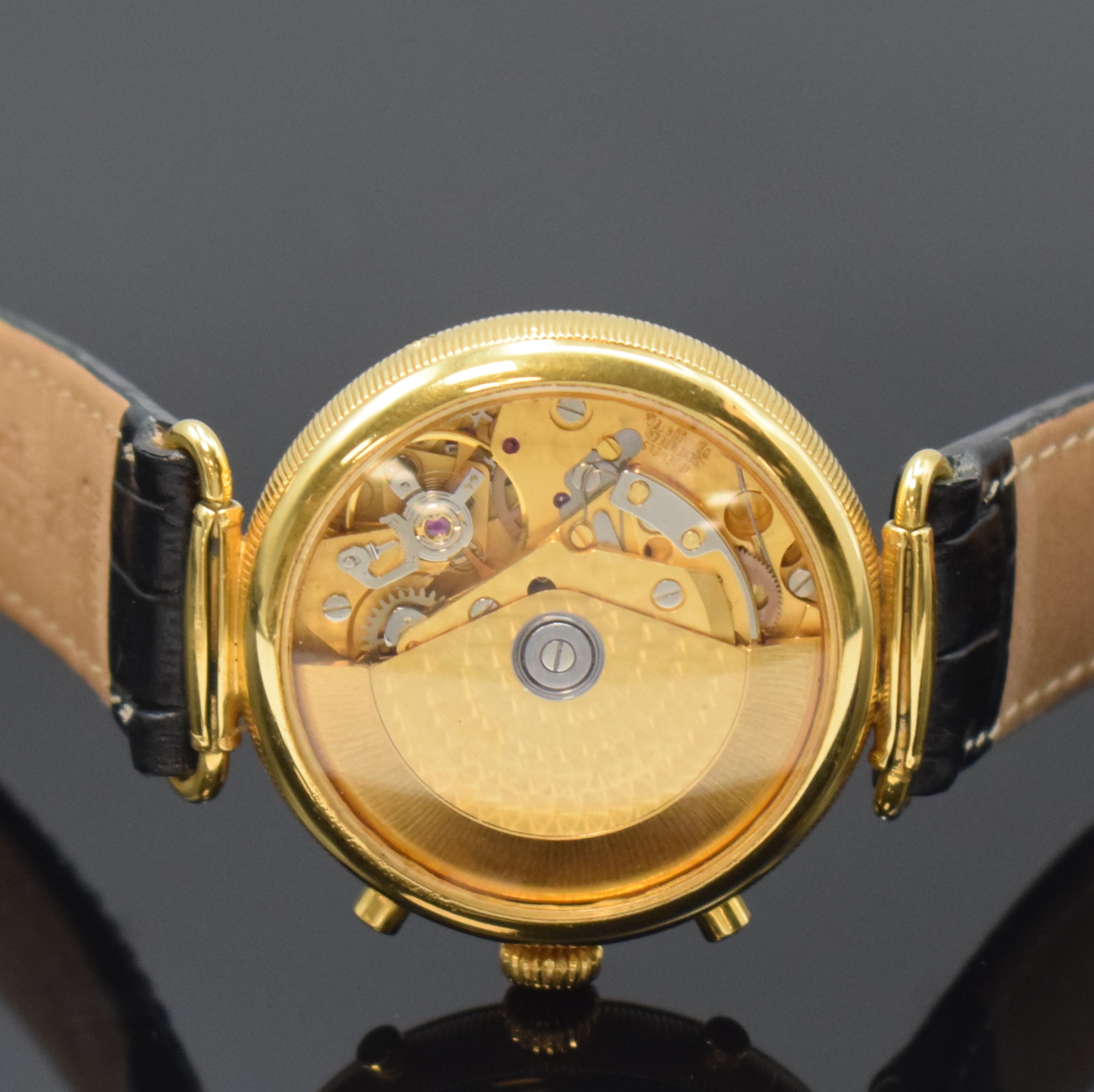 Detail f: Herrenarmbanduhr mit Chronograph und Vollkalender, Schweiz um 1995, Automatik, beids. vergl. Geh., Boden aufgedr., Korrekturdrücker seitl. im Geh. ...