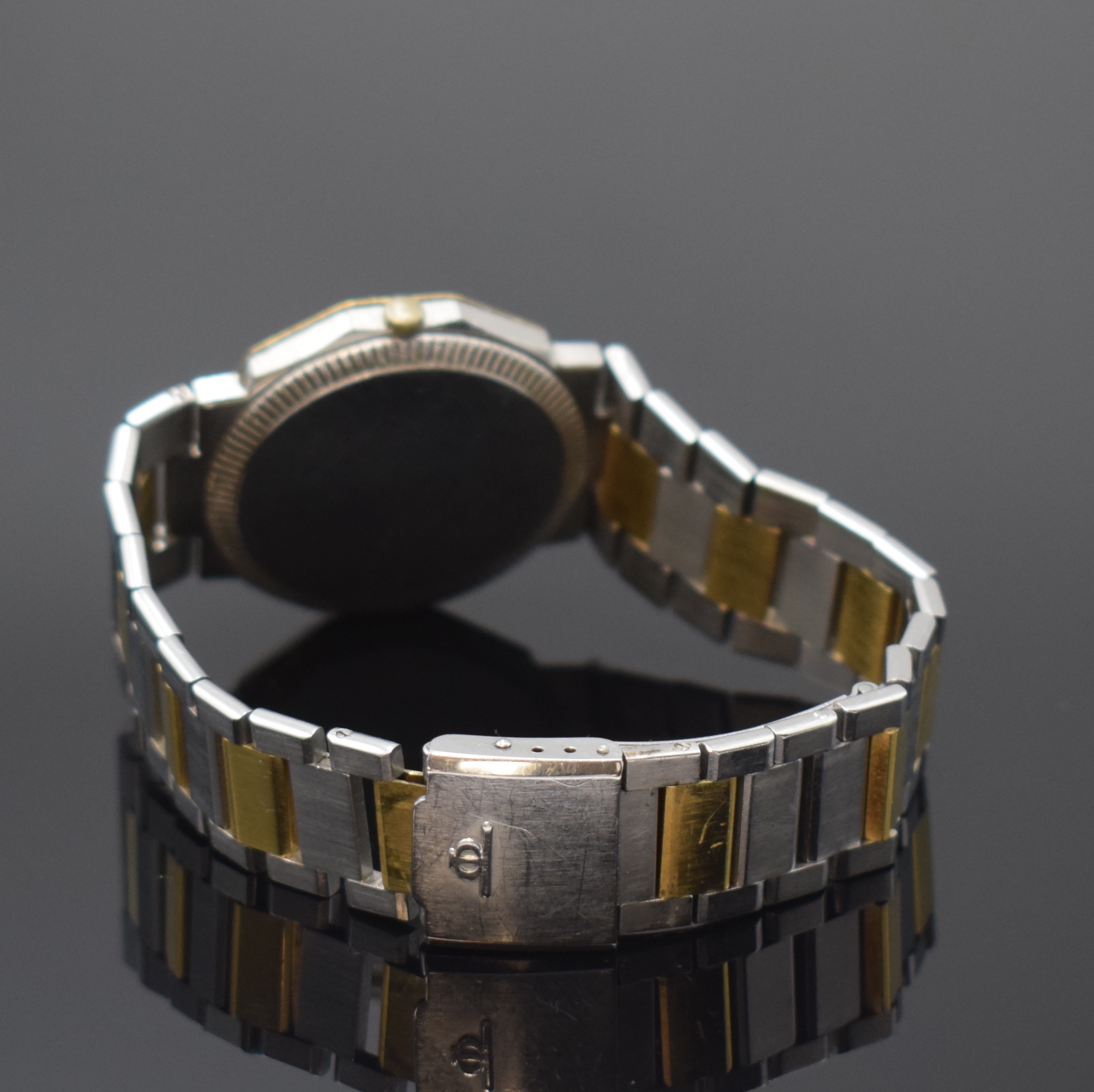 Detail b: BAUME & MERCIER Riviera Herrenarmbanduhr Referenz 5112.018, Schweiz um 1990, quarz, Edelstahl/Gold komb., Boden verschr., Gliederband m. Faltschl., ...
