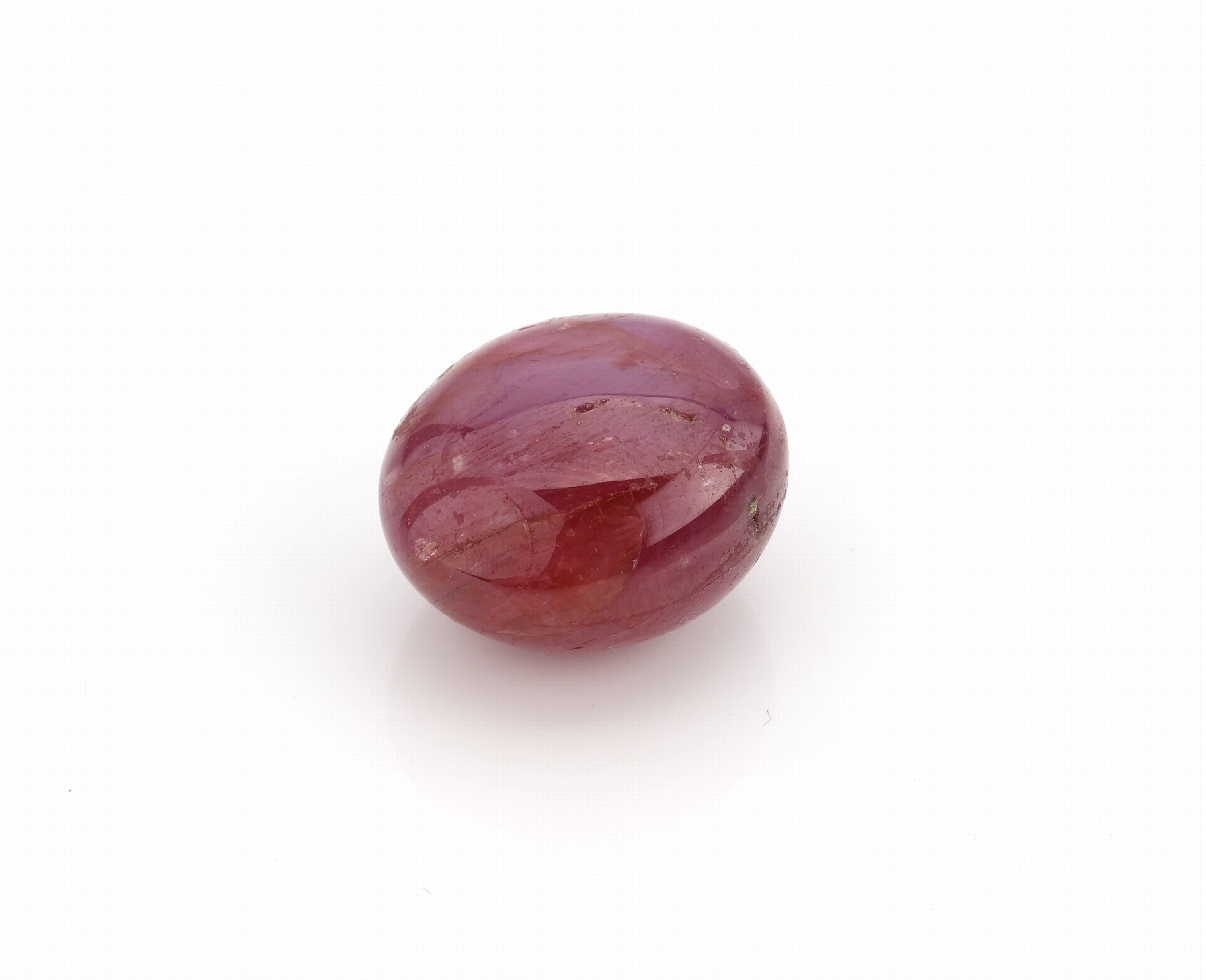 Detail a: Loser Sternrubin, ca. 24.5 ct, ovaler Cabochon