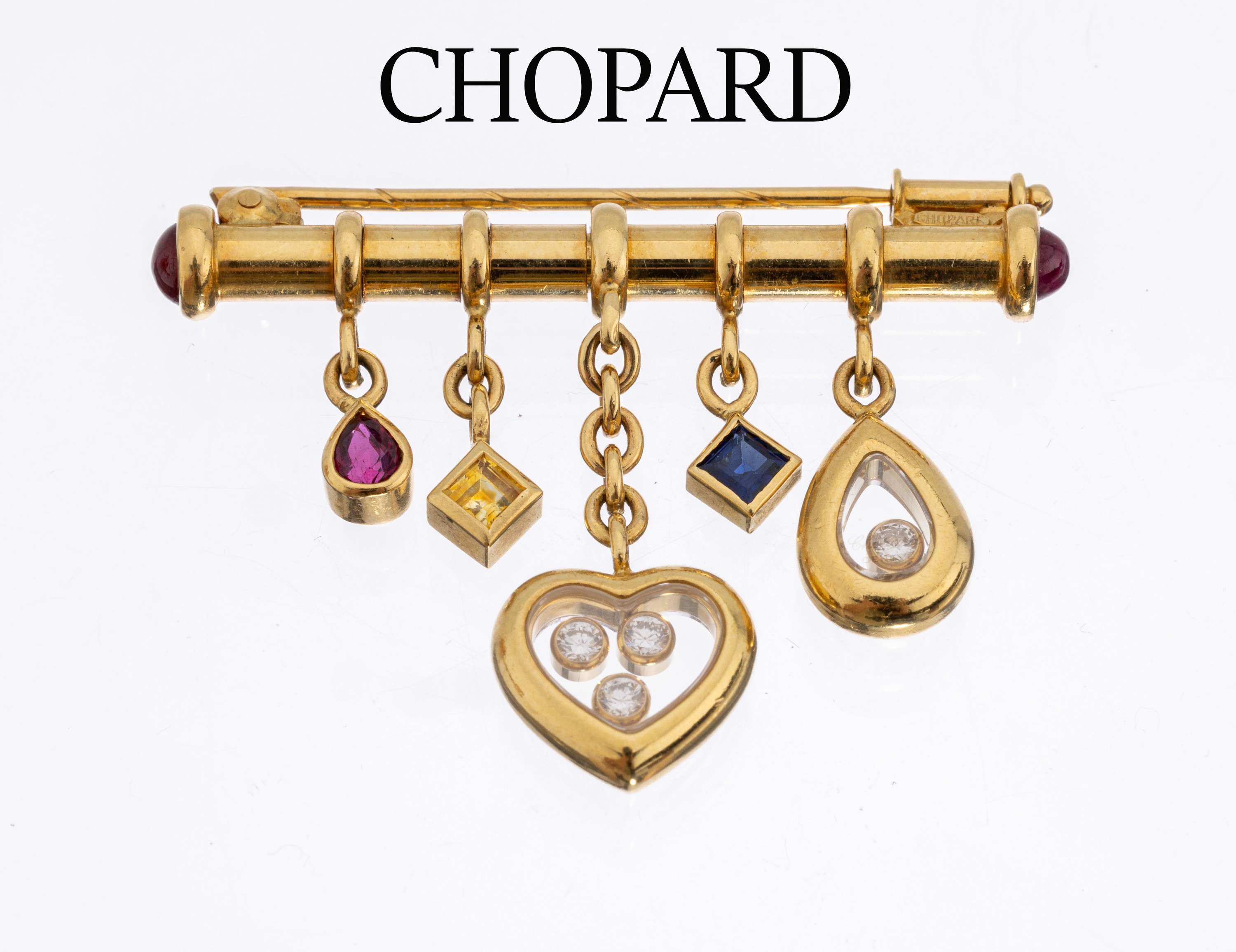 18 kt Gold CHOPARD Brillant-Farbstein-Brosche, GG 750/000, länglicher Stab mit bewegl. Abhängungen, 1 Herz und 1 Tropfen mit insg. 4 bewegl. hinter ...