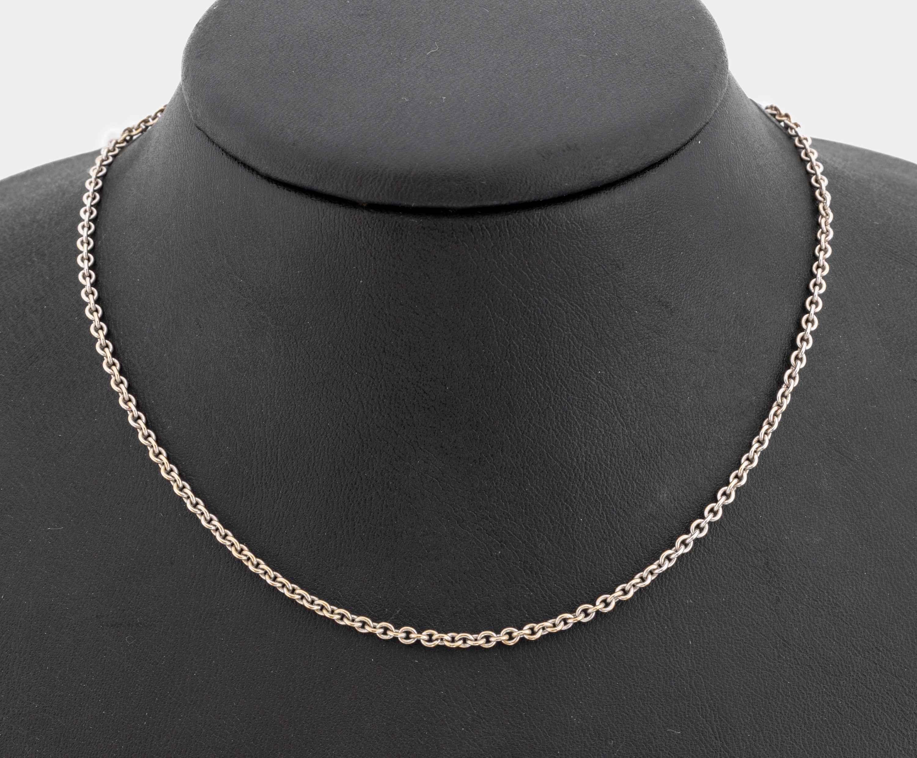 18 kt Gold Kette, ca. 9.6 g, WG 750/000, L ca. 45/51 cm, Karabinerschließe